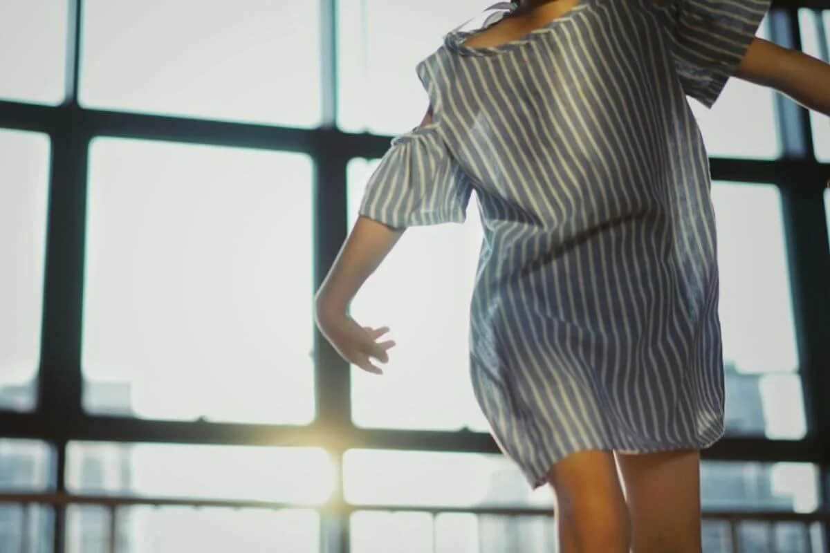 Woman dancing and happy