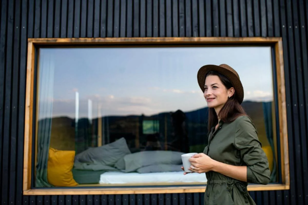 A woman holding a mug