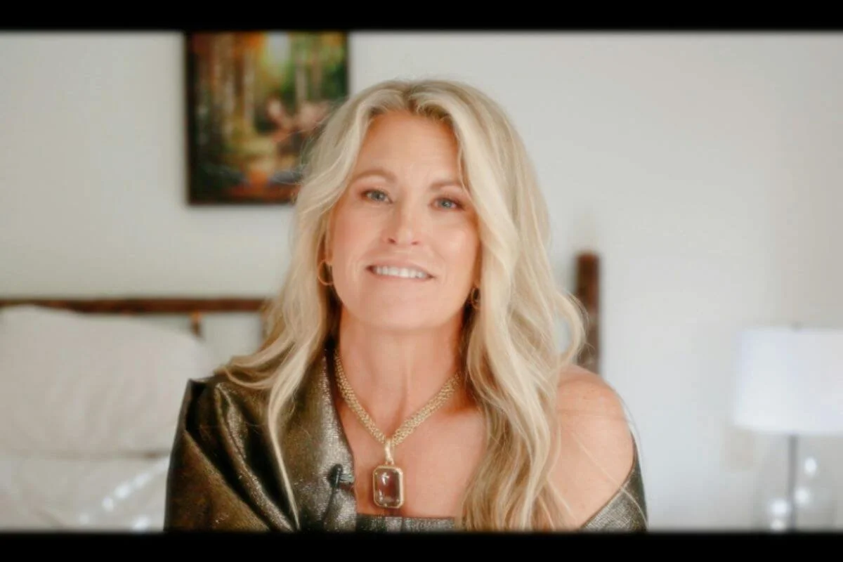 A woman in her 50's smiling