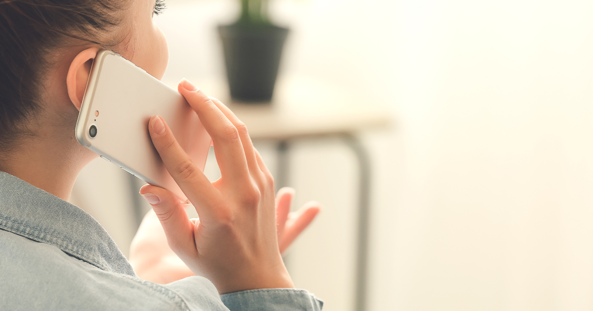 Parent on a call learning what's included in a sleep training package