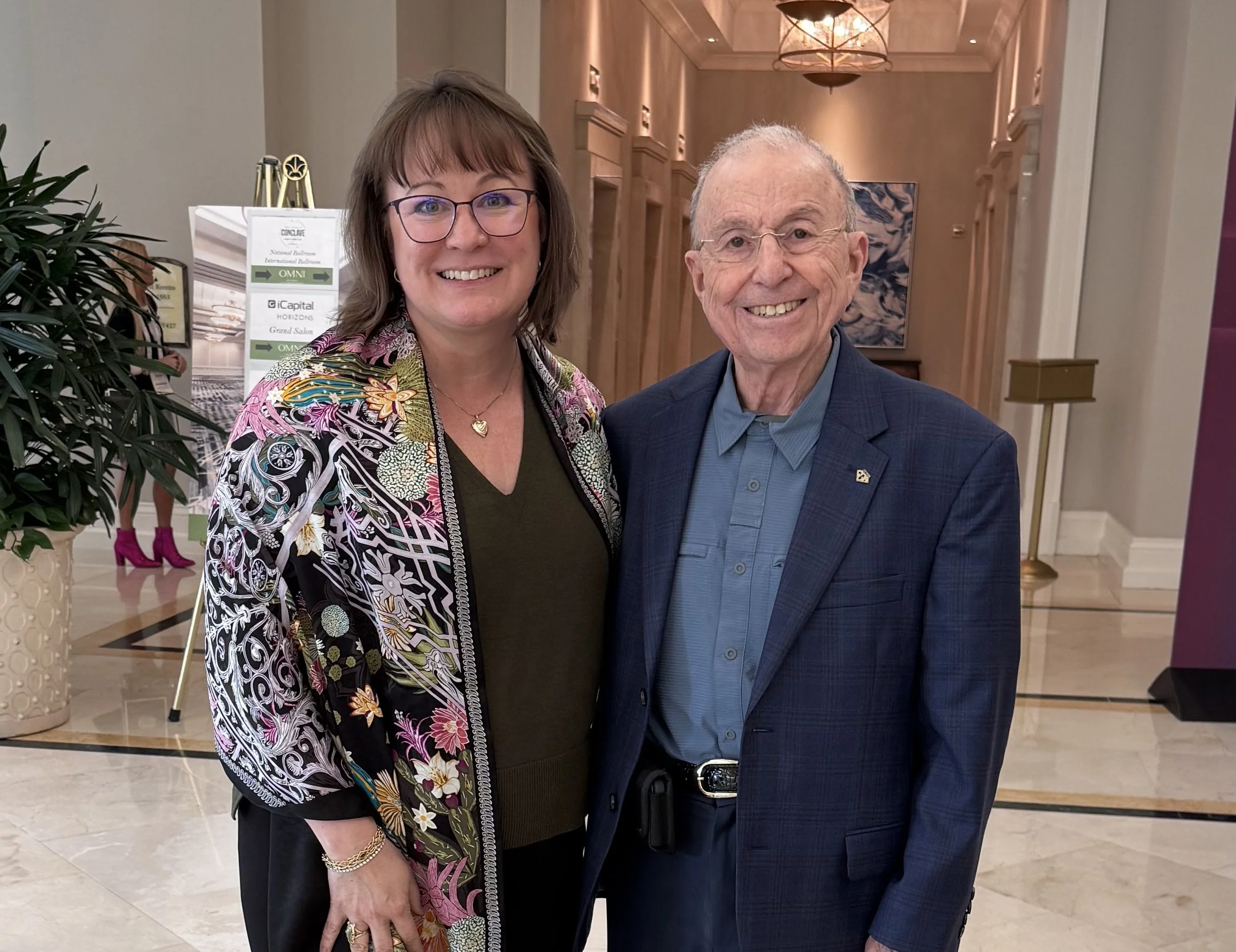 Experienced Jewelry Appraisers, Kim Graham and Ben Gordon, in Houston, Smiling Towards The Camera