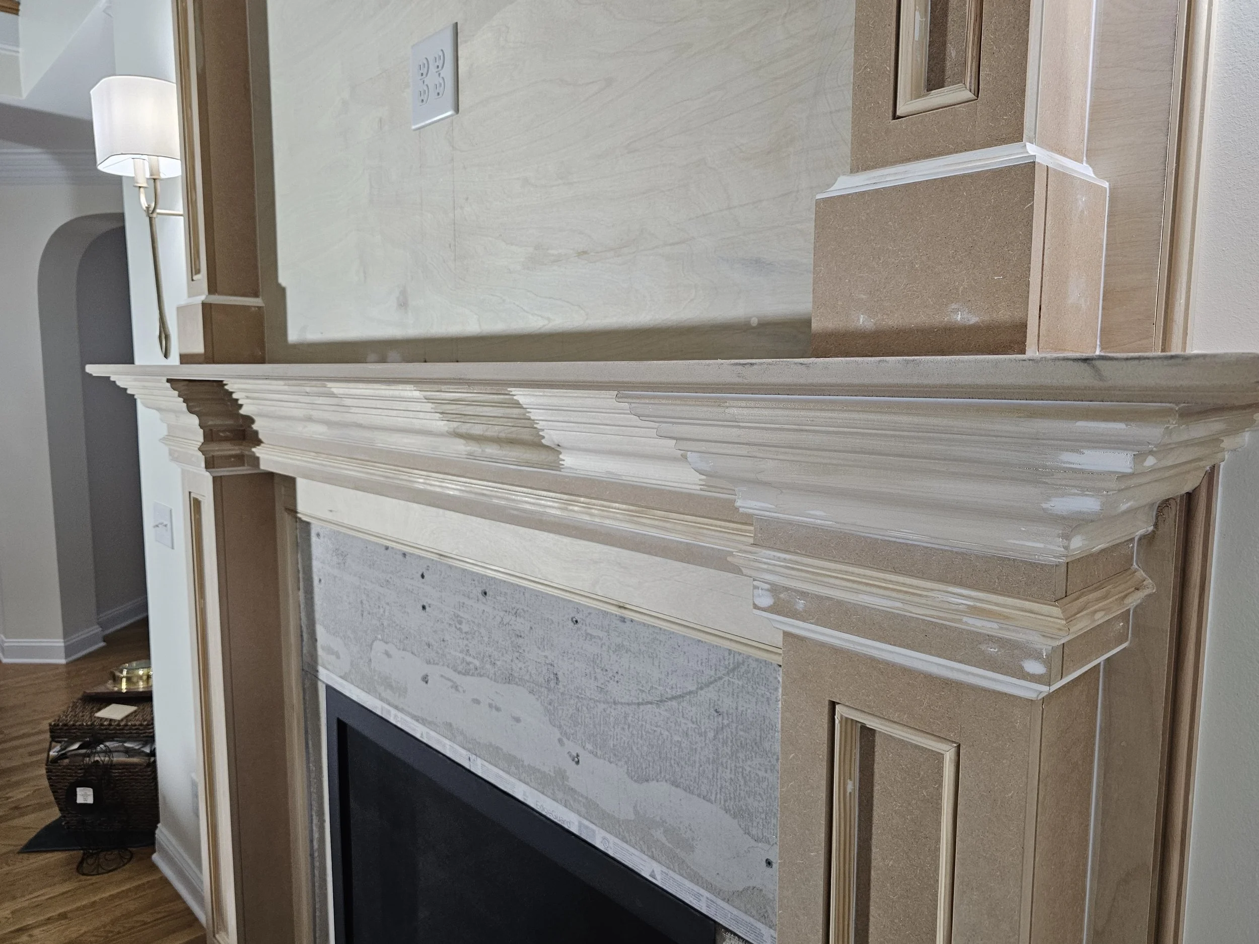 Custom fireplace crown moulding and mantel detail - Oak Ridge NC