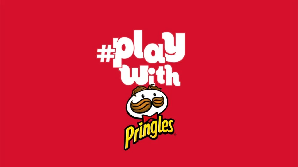 The Pringles logo on a red background with the hash tag #playwith above it. 