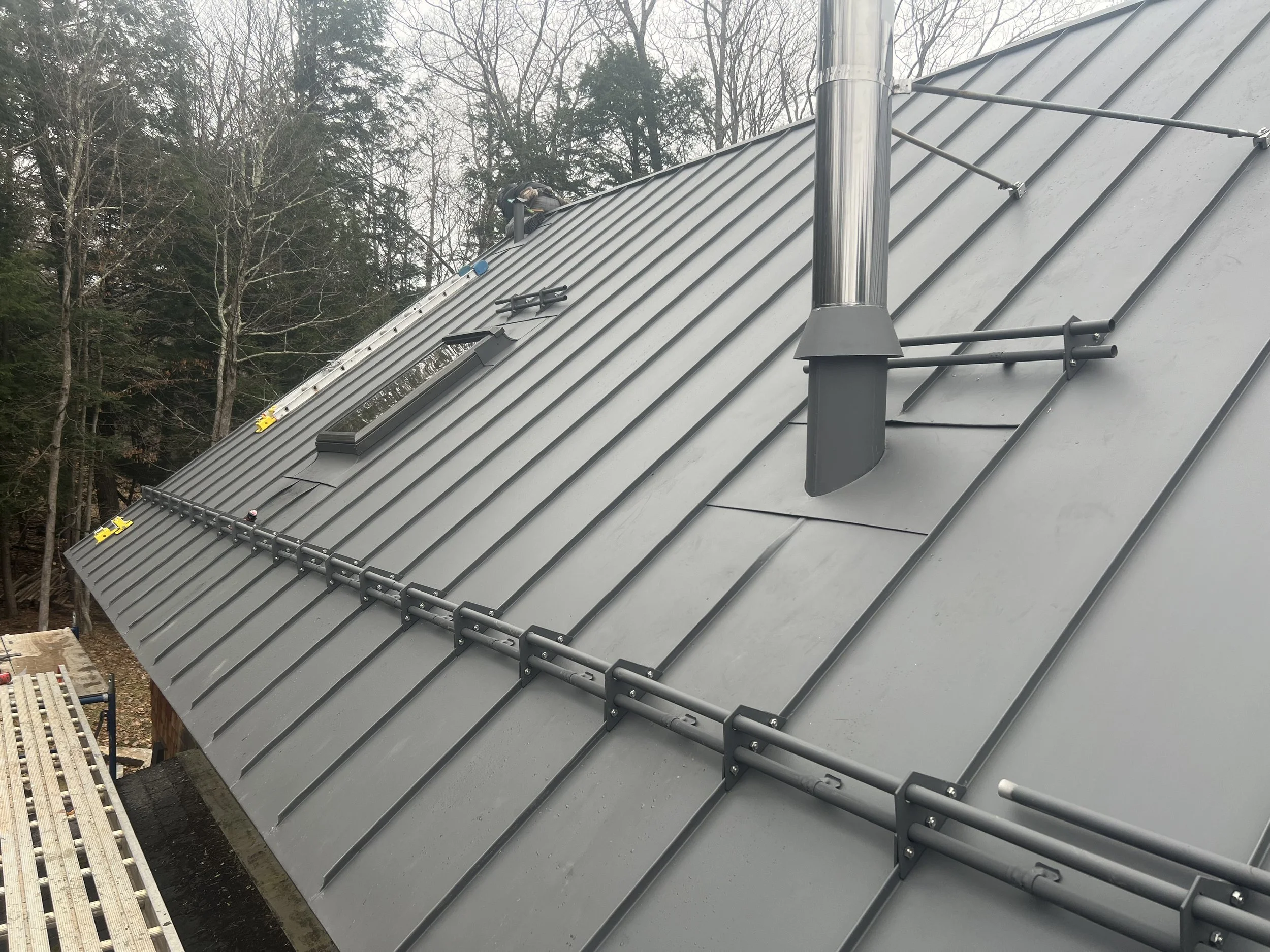 Sympathetic detailing. Pipe boot fitting.