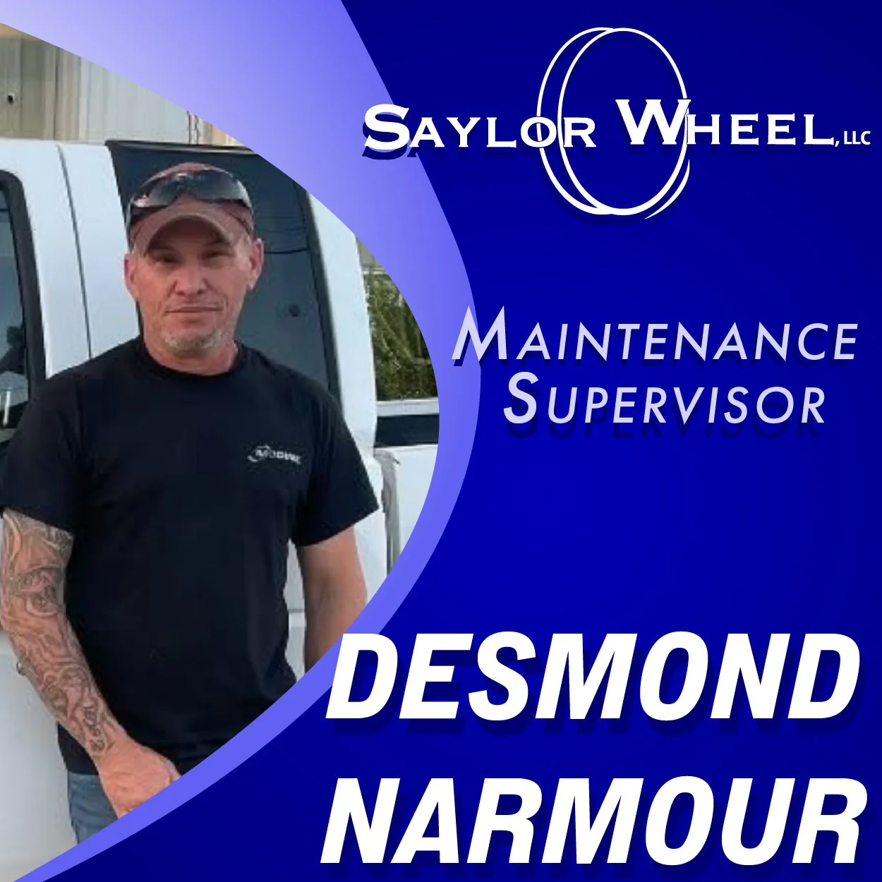 Image features a man in a black T-shirt with tattoos on his left arm standing in front of a white vehicle, with text overlay reading 'Saylor Wheel, Maintenance Supervisor, Desmond Narmour,' on a blue background with a logo.