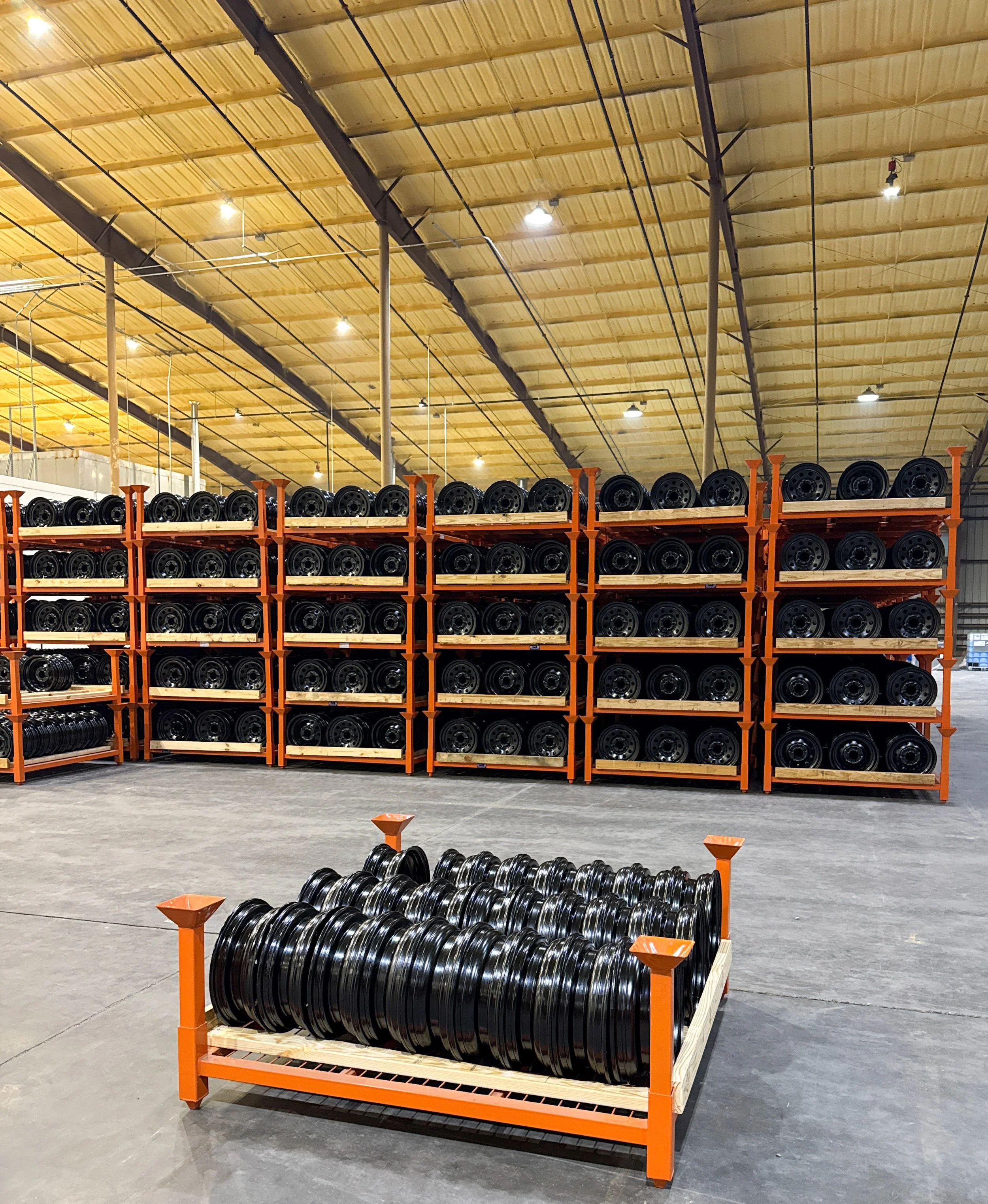 Finished glossy black steel wheels arranged to be shipped off