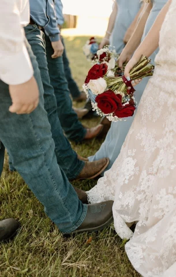 Fun and rustic wedding shot featuring the bride and groom and wedding party! 