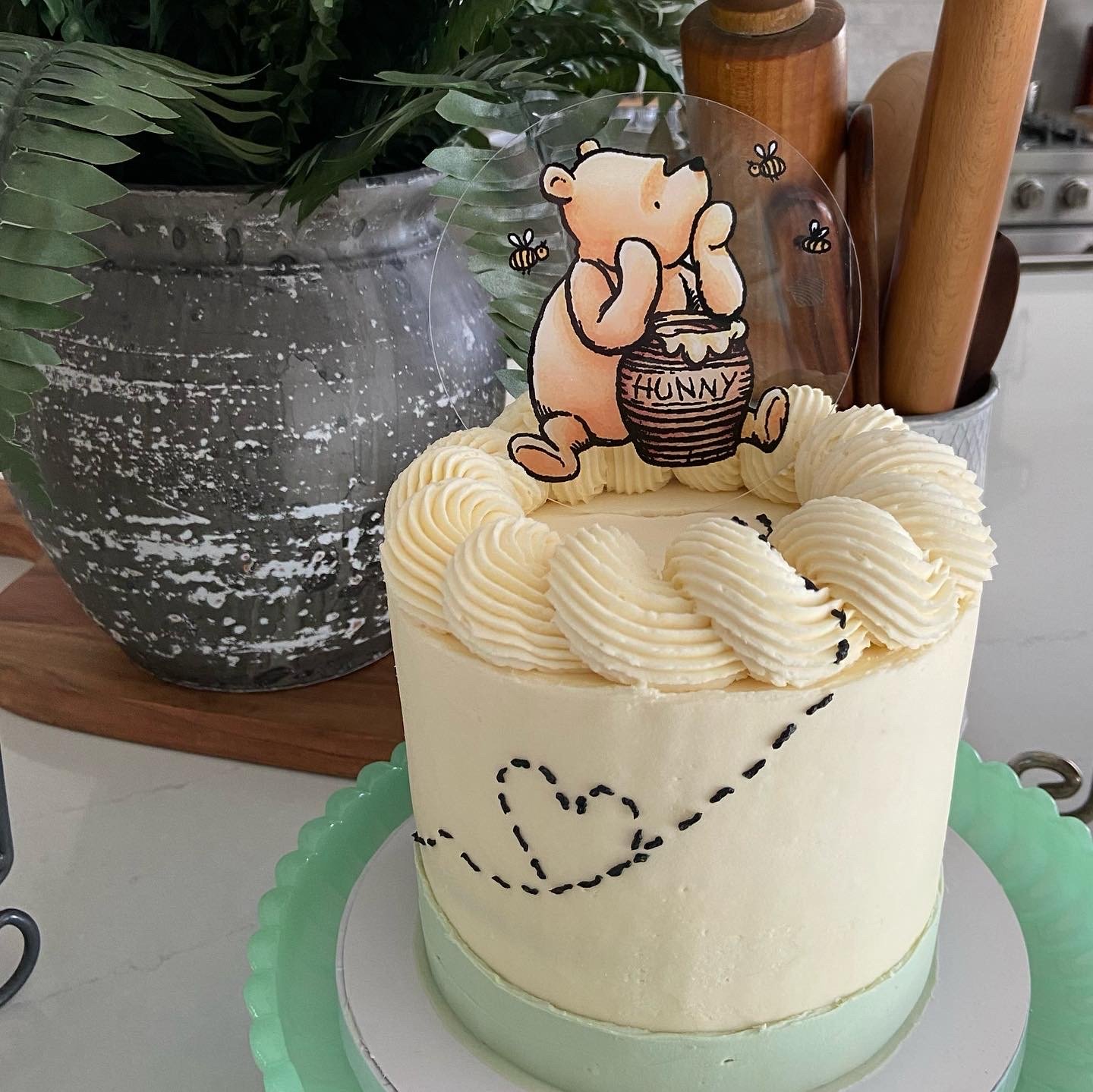 A little hunny is on the way baby shower cake by The Quirky Spatula. 