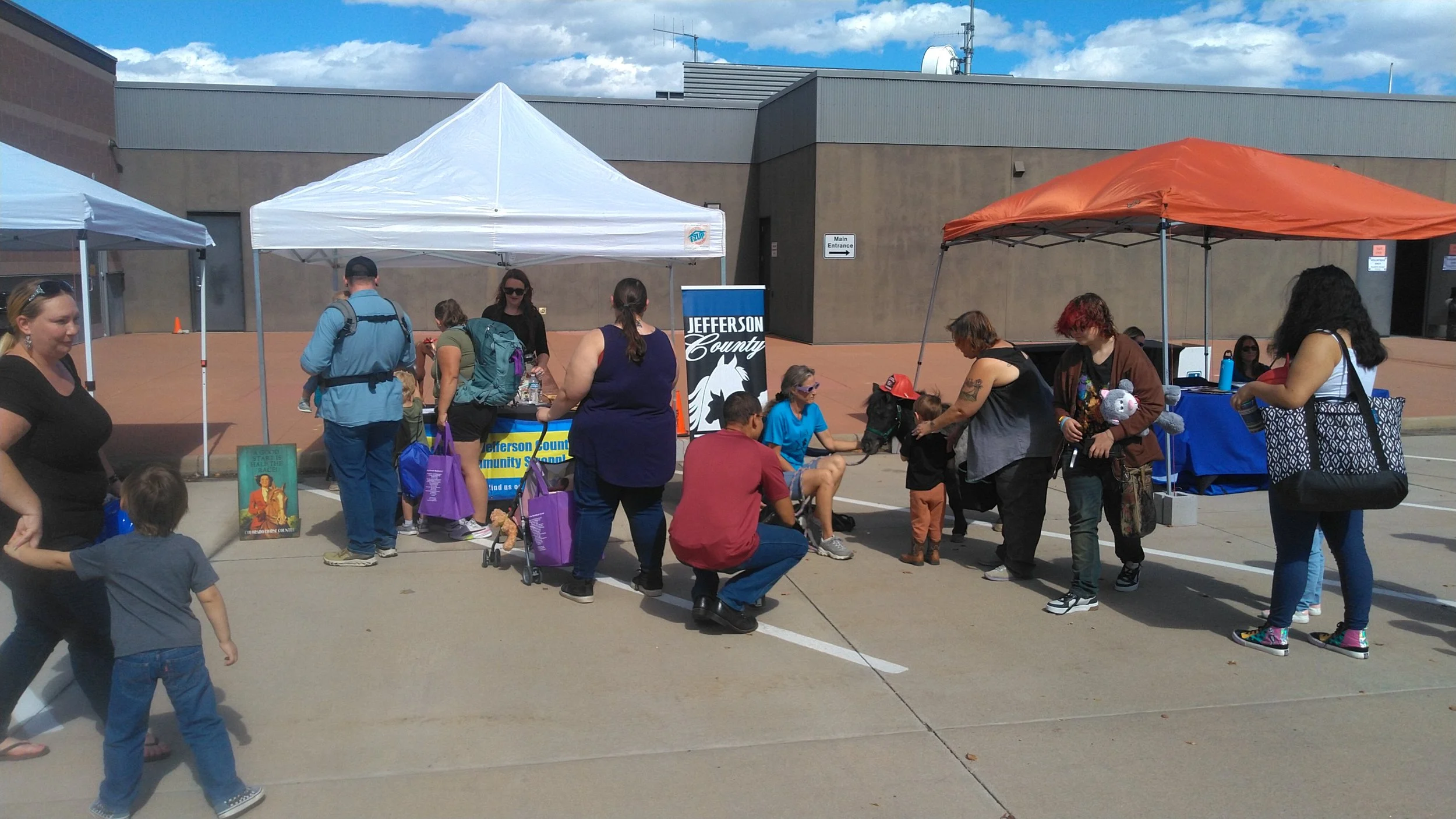 Squiggy the mini joins JCHC volunteers at the Foothills Fire Muster - September, 2025
