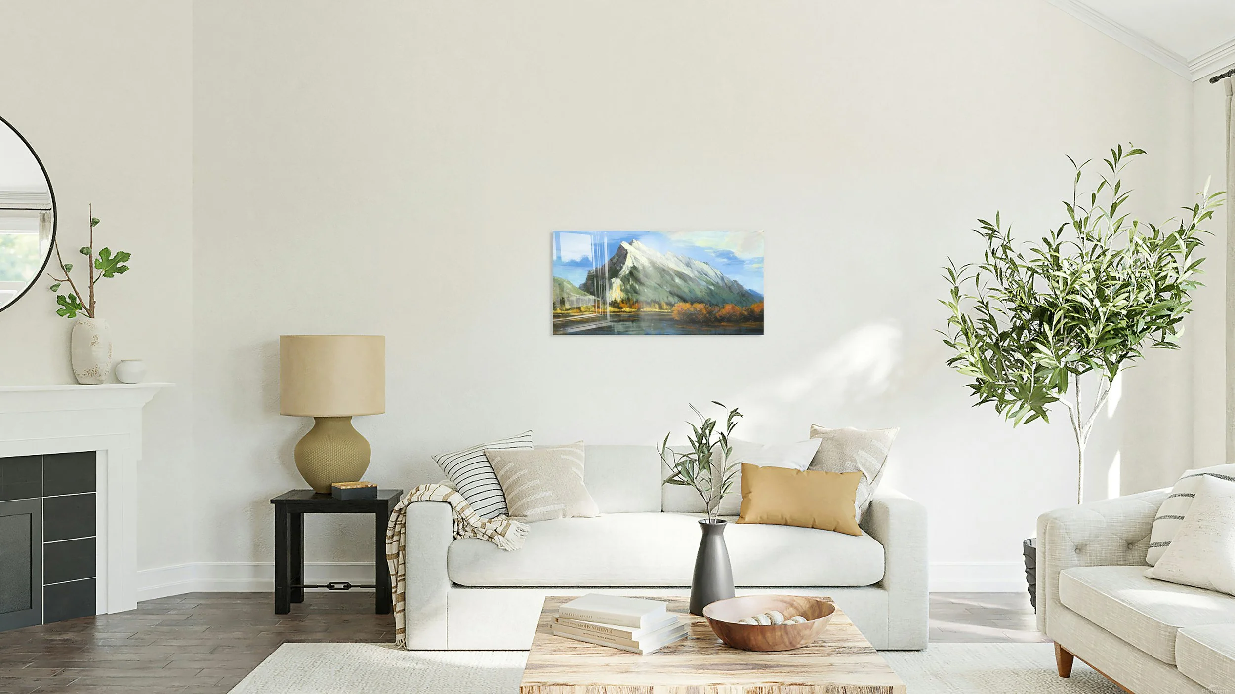 Mount Rundle Peak by Martin Pryce, unsigned print above a white sofa in a living room with a fireplace