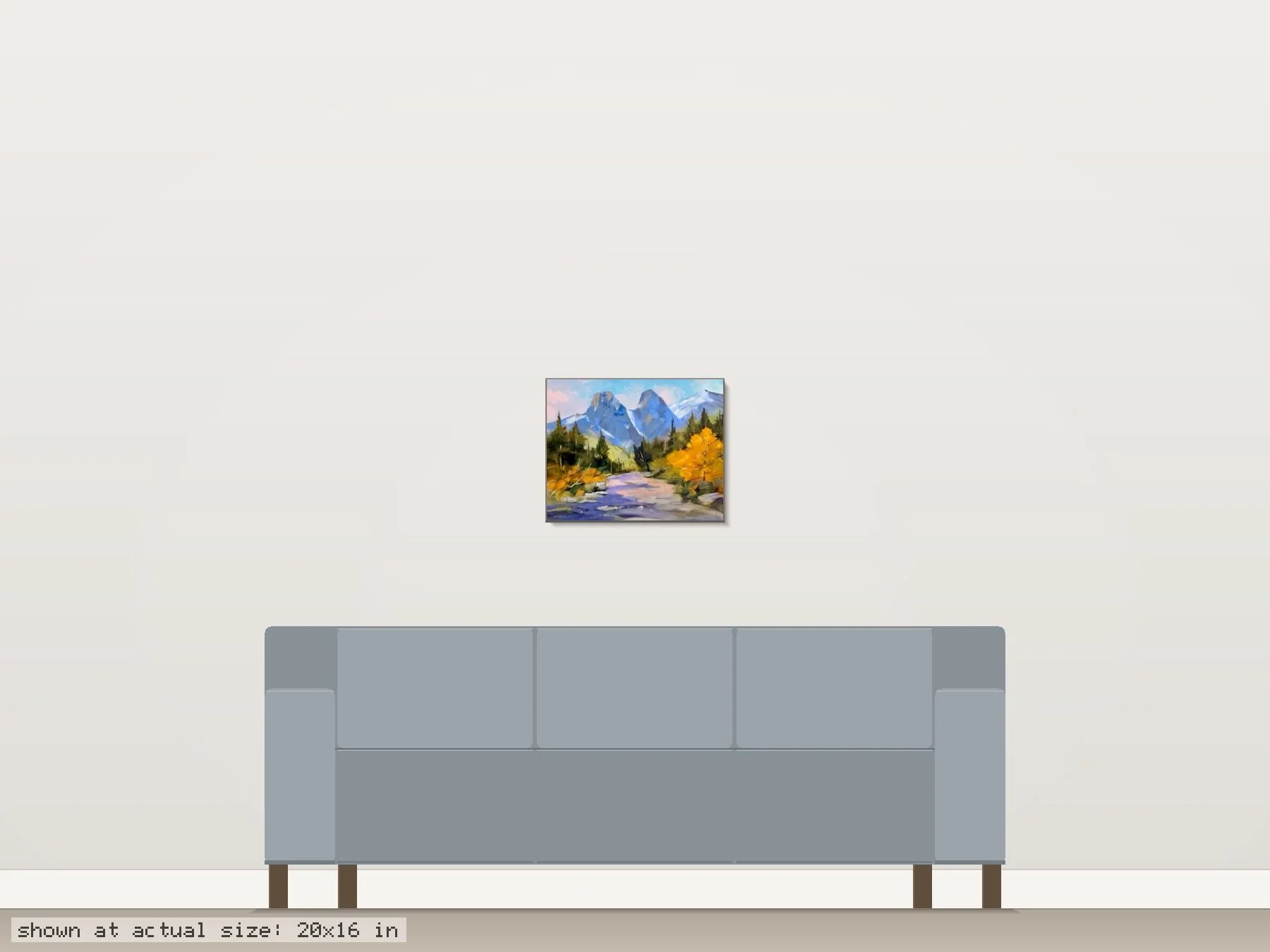 Three Sisters Mountains, Canmore by Martin Pryce shown at actual size (20 x 16 in) on a wall above an 84-inch sofa — room-scale view of the original painting.