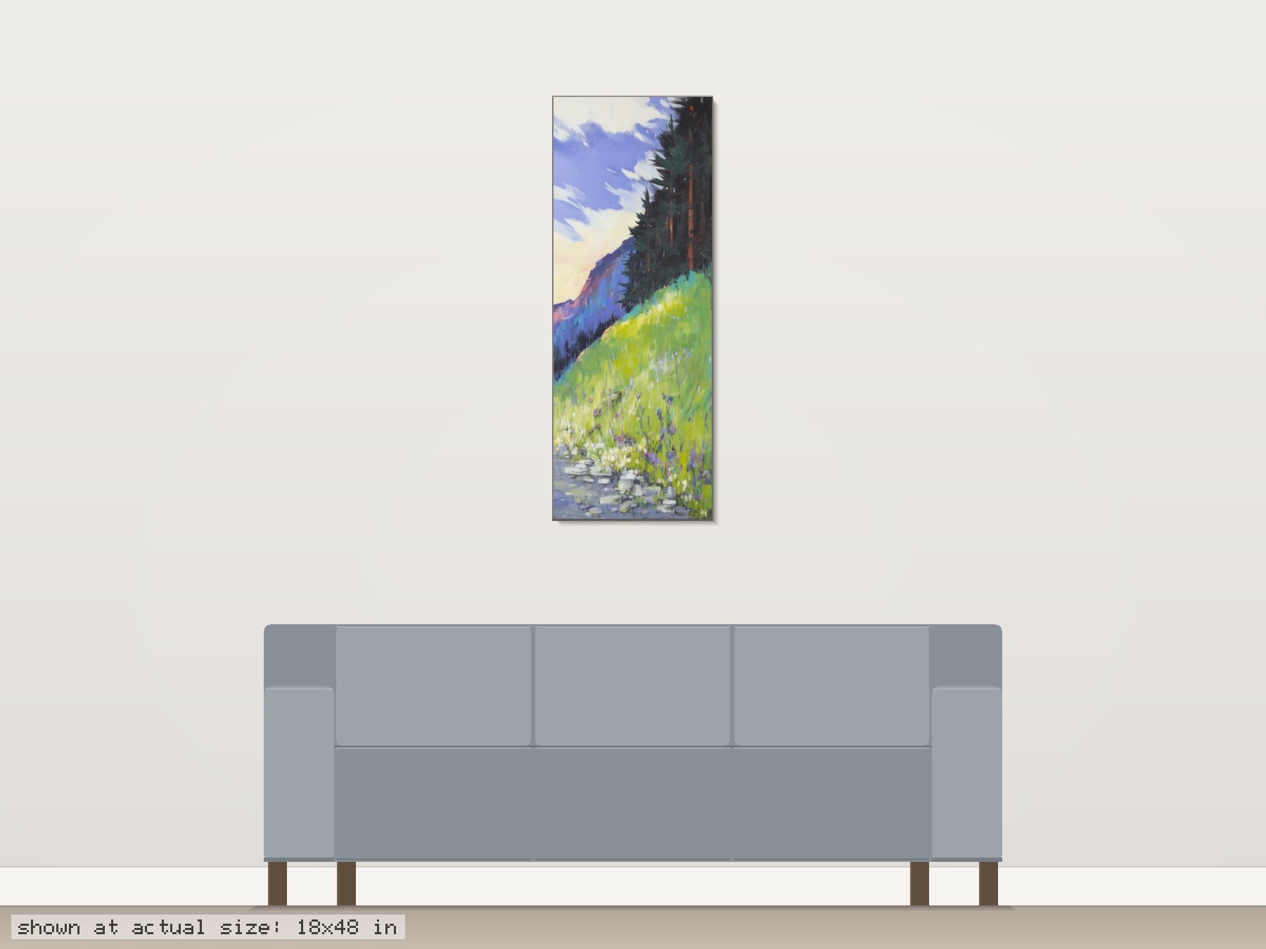Hillside Pathway by Martin Pryce shown at actual size (18 x 48 in) on a wall above an 84-inch sofa — room-scale view of the original painting.