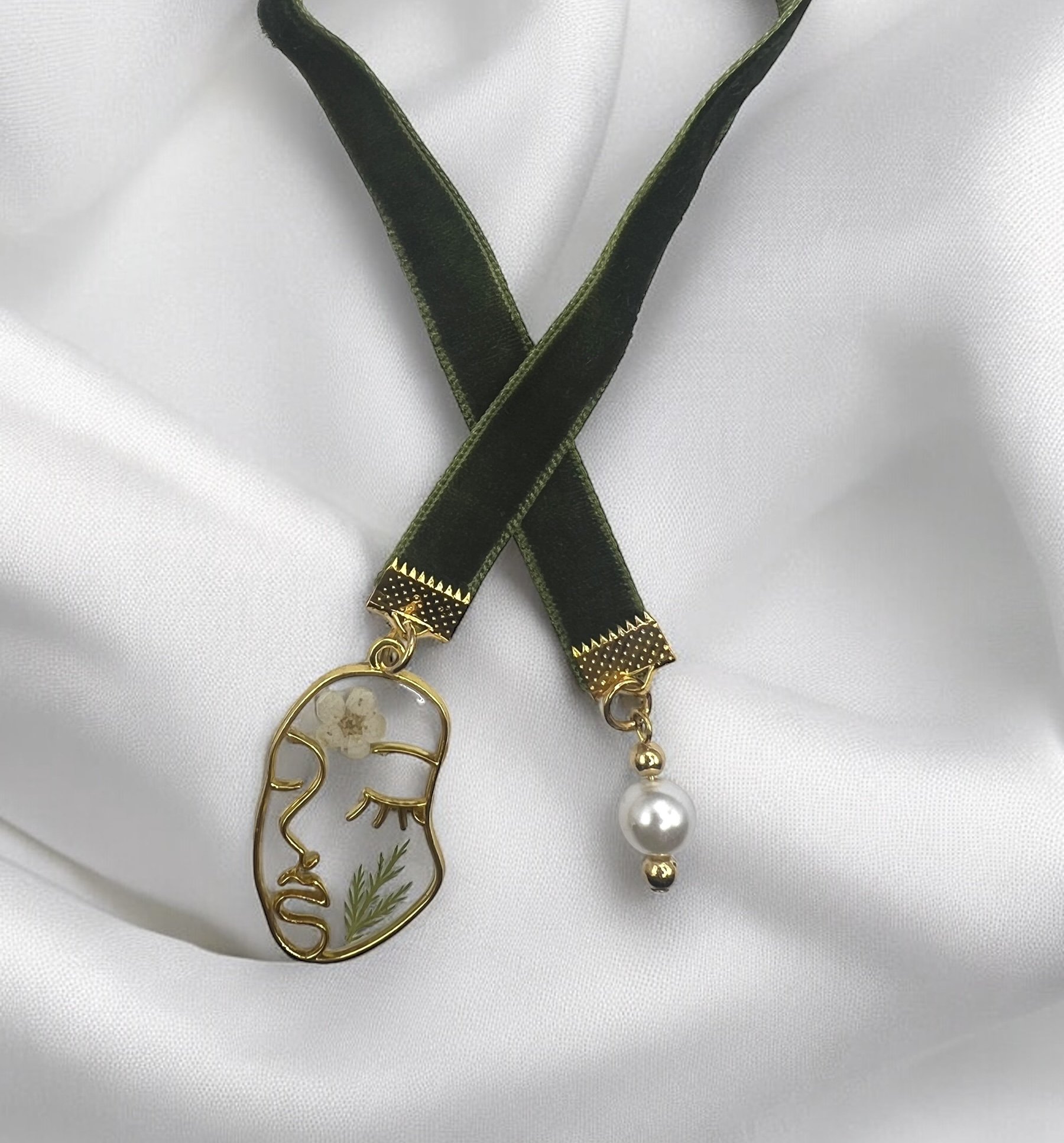 Green face bookmark