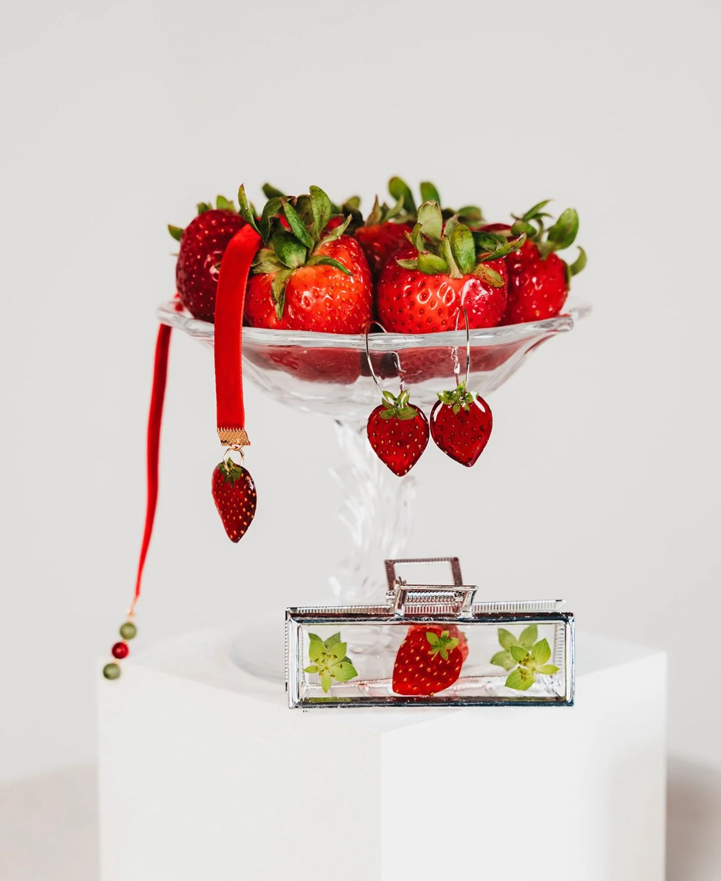 I&rsquo;m not sure if it&rsquo;s our Minnesotans protest against winter or what, but I dipped my toe in the water of bringing back out the fruit jewelry and the strawberries sold out in record time.
🍓🍓🍓
-
Move aside hair clips, the berries are now