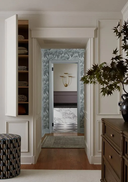 Vesige Home, Philadelphia Interior designer, created millwork that is hidden from view until needed.