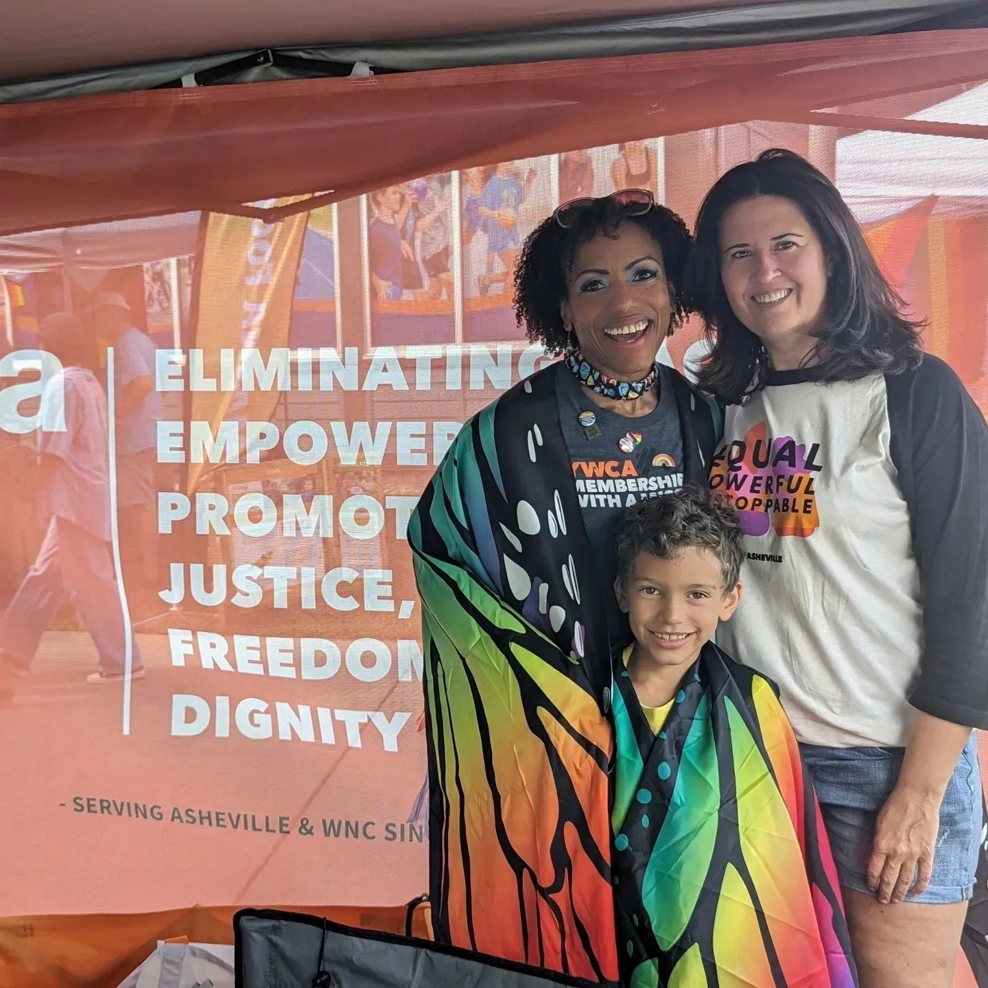 Amparo Tiffany and Solvi at YW Pride Table.jpg