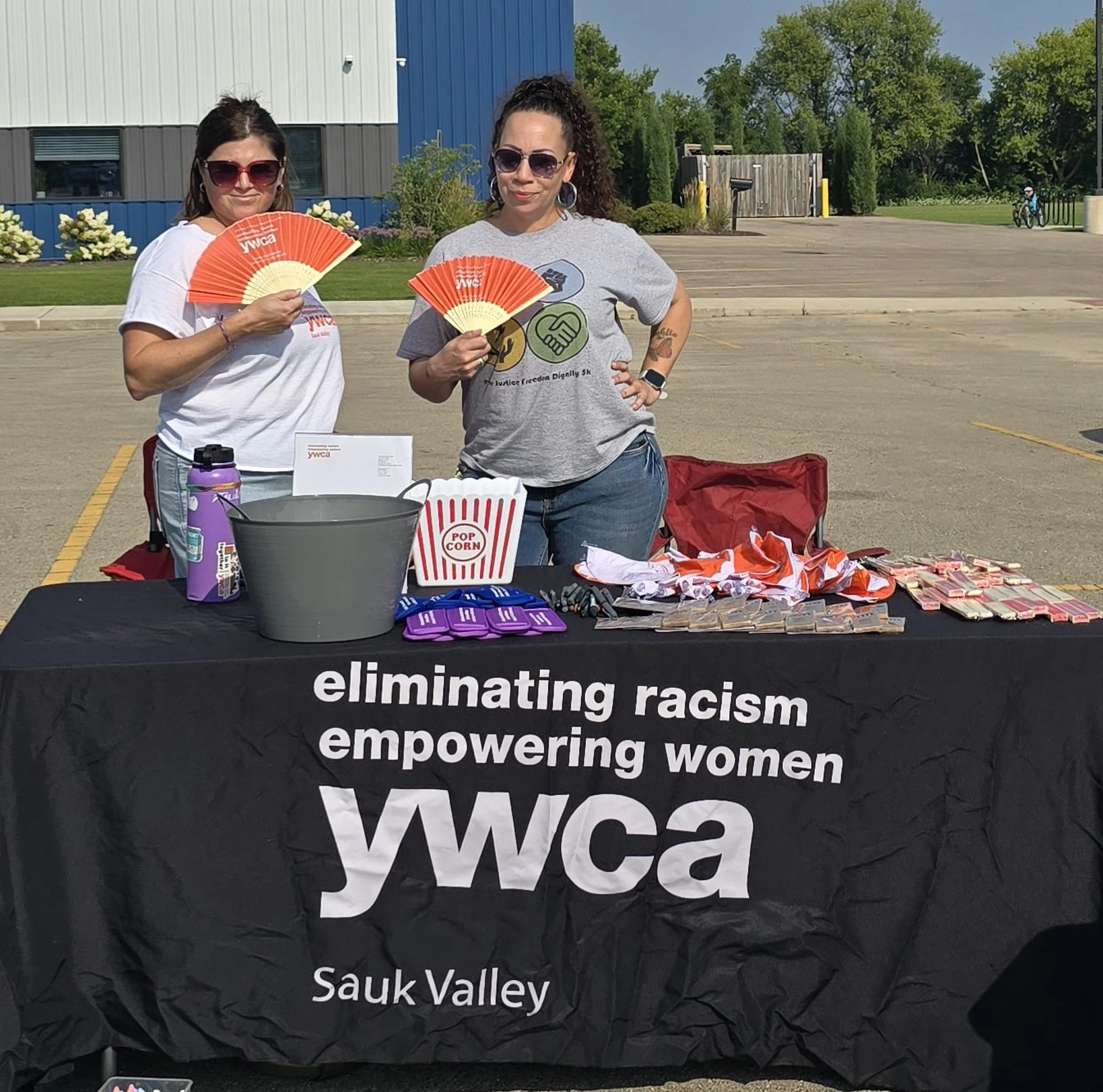 Staff at Dixon's National Night Out spreading awareness. of YWCA's Services.