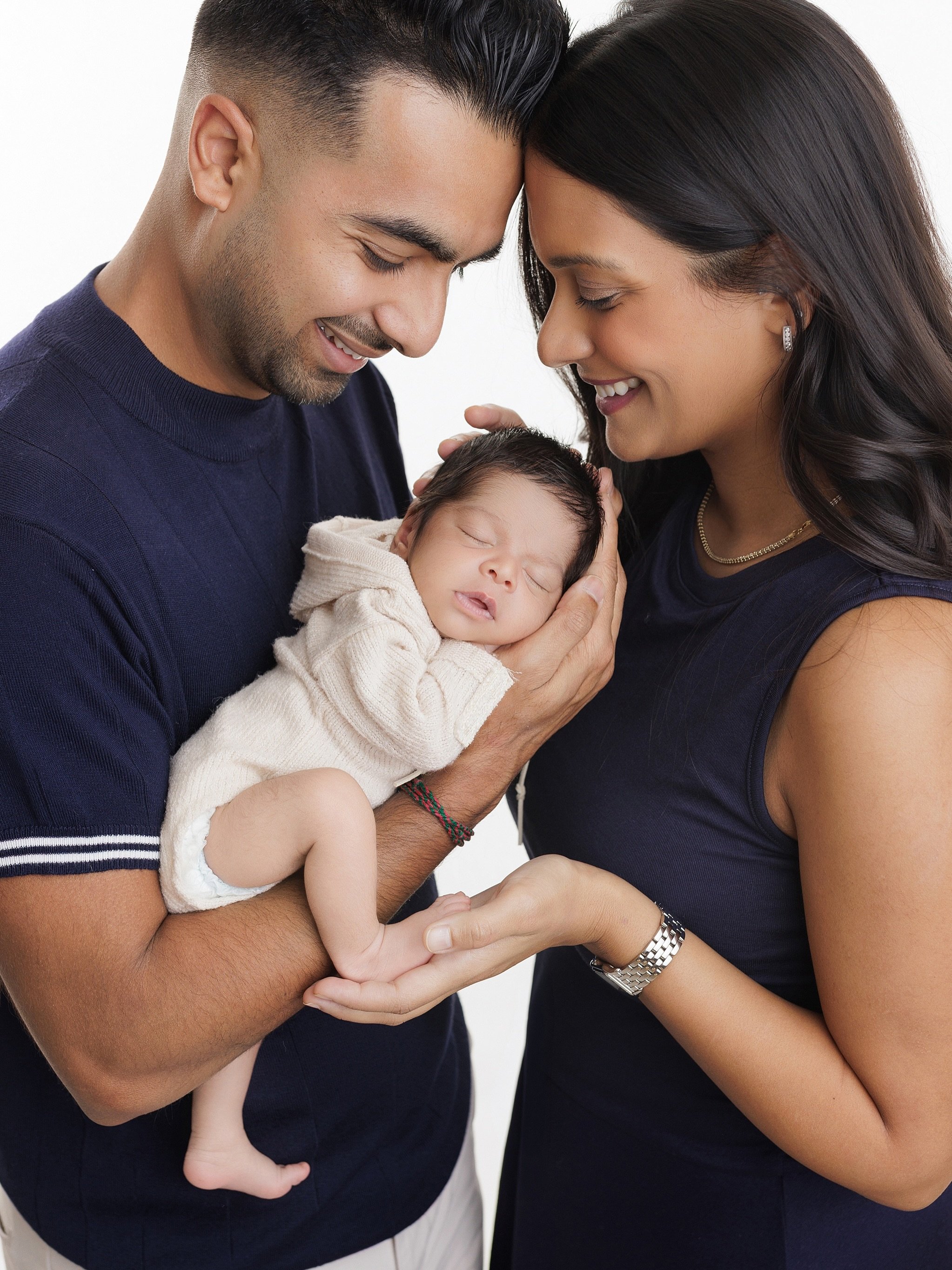 The sweetest little addition to their world. 😍

There&rsquo;s something so beautiful about classic newborn family portraits. Simple backgrounds, timeless styling, and genuine moments of love. No elaborate setups or distractions, just the sweetest li