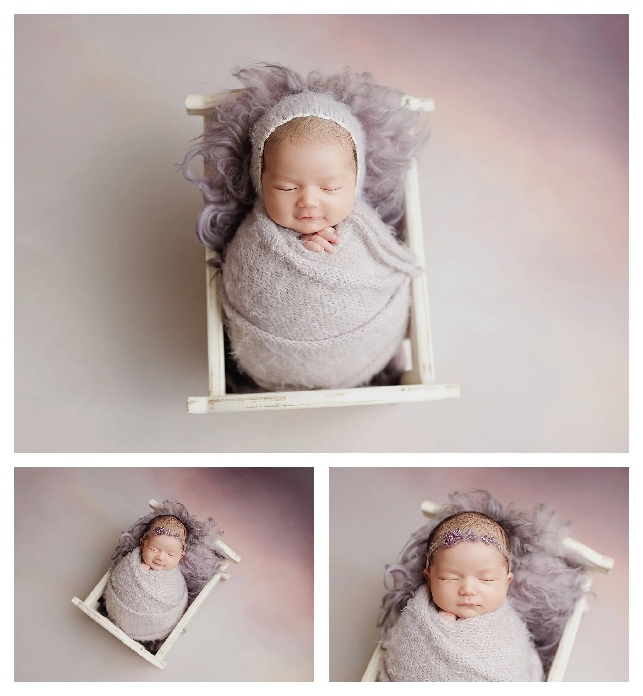 a sleeping newborn wrapped in lavender in a miniature white wooden bed, wearing a knit bonnet or delicate purple headband.