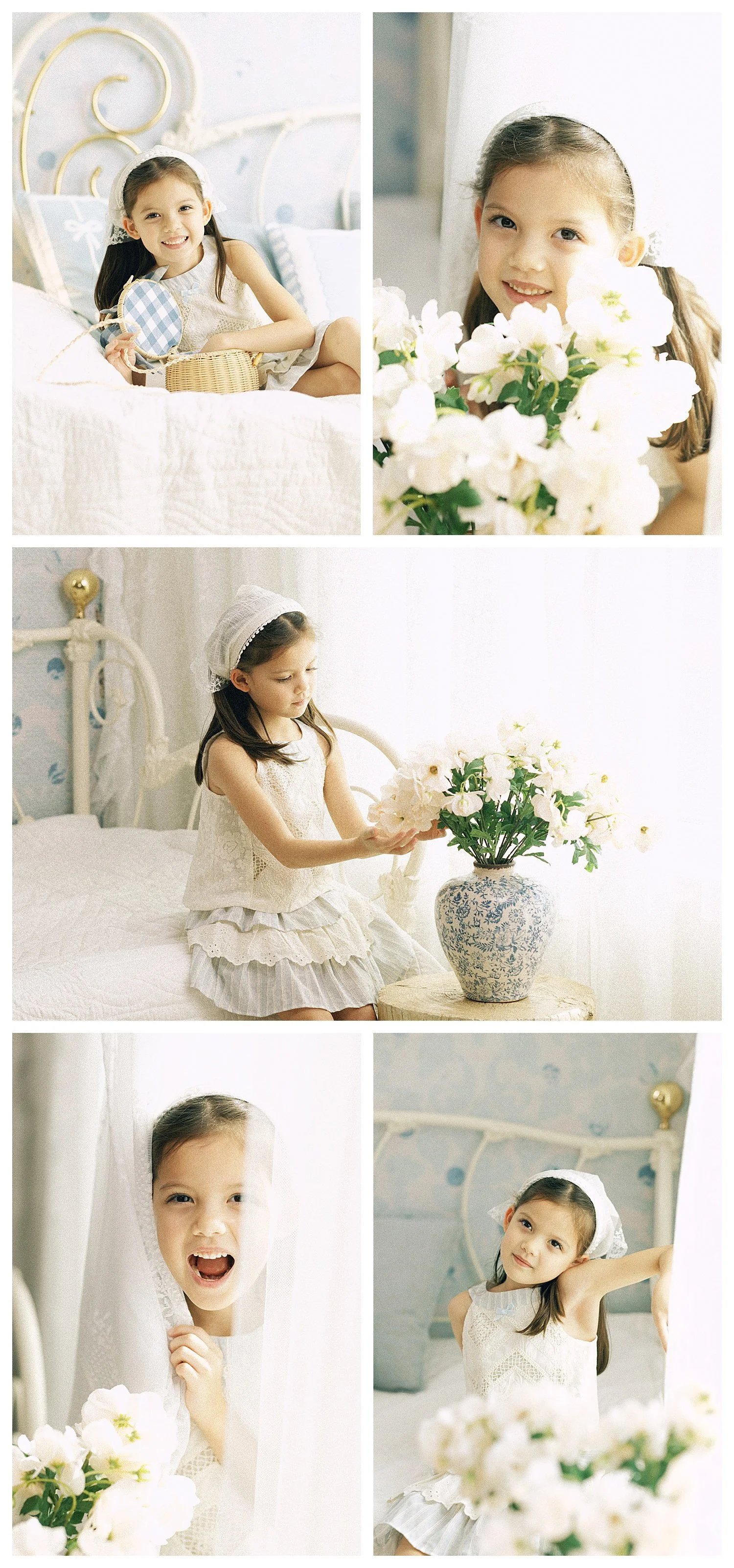 Little girl in a vintage-inspired outfit posing with flowers in a soft blue Storybook Bedroom portrait session in Southlake, Texas.