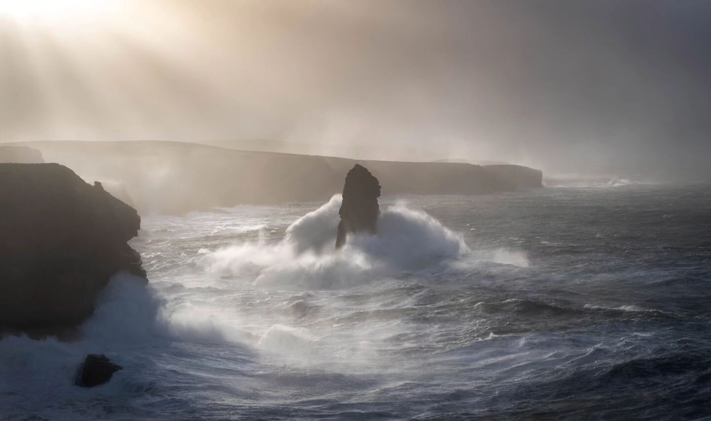 A storm last year batters the west coast just as the sun broke through for 2 min that day. For scale that sea stack is 60m tall. Haven't got out for a storm this year, will we get another one? #wildatlanticway #ireland #landscapephotography