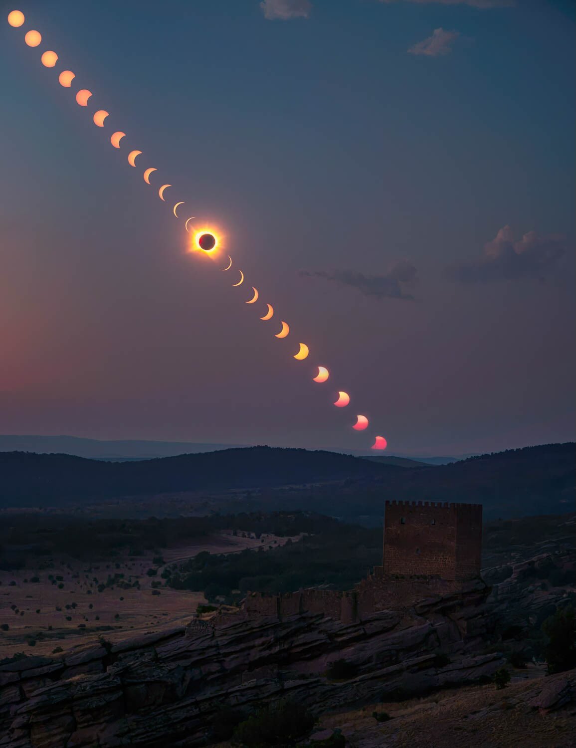 The solar eclipse over Zafra Castle, an amazing castle perched on top of a rock somewhere in Spain. It was amazing to photograph and watch the total eclipse as this location. I put together this sequence of shots shot at 70mm over the 2 hour period f