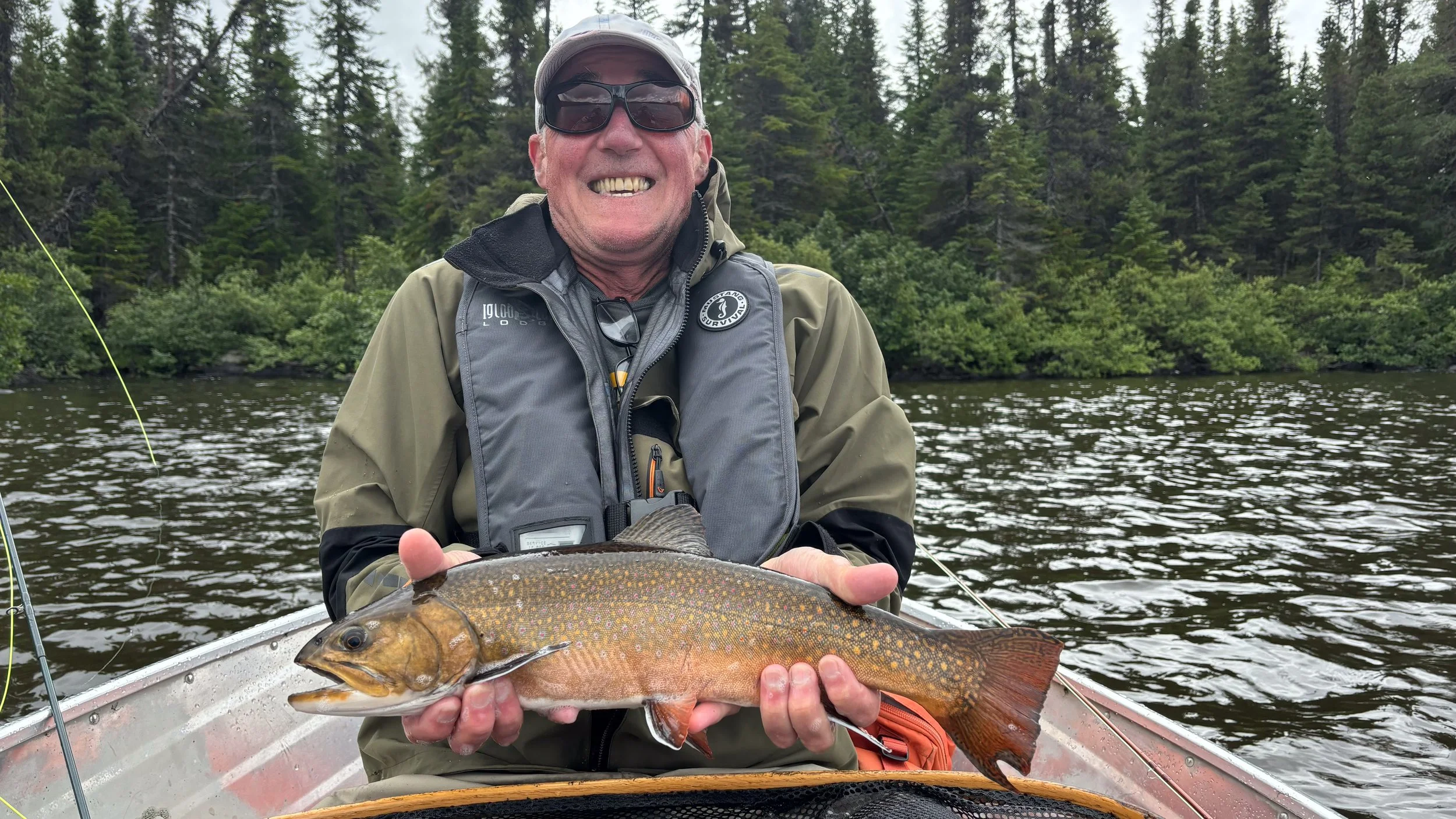 Excitement of catching a Brook trout