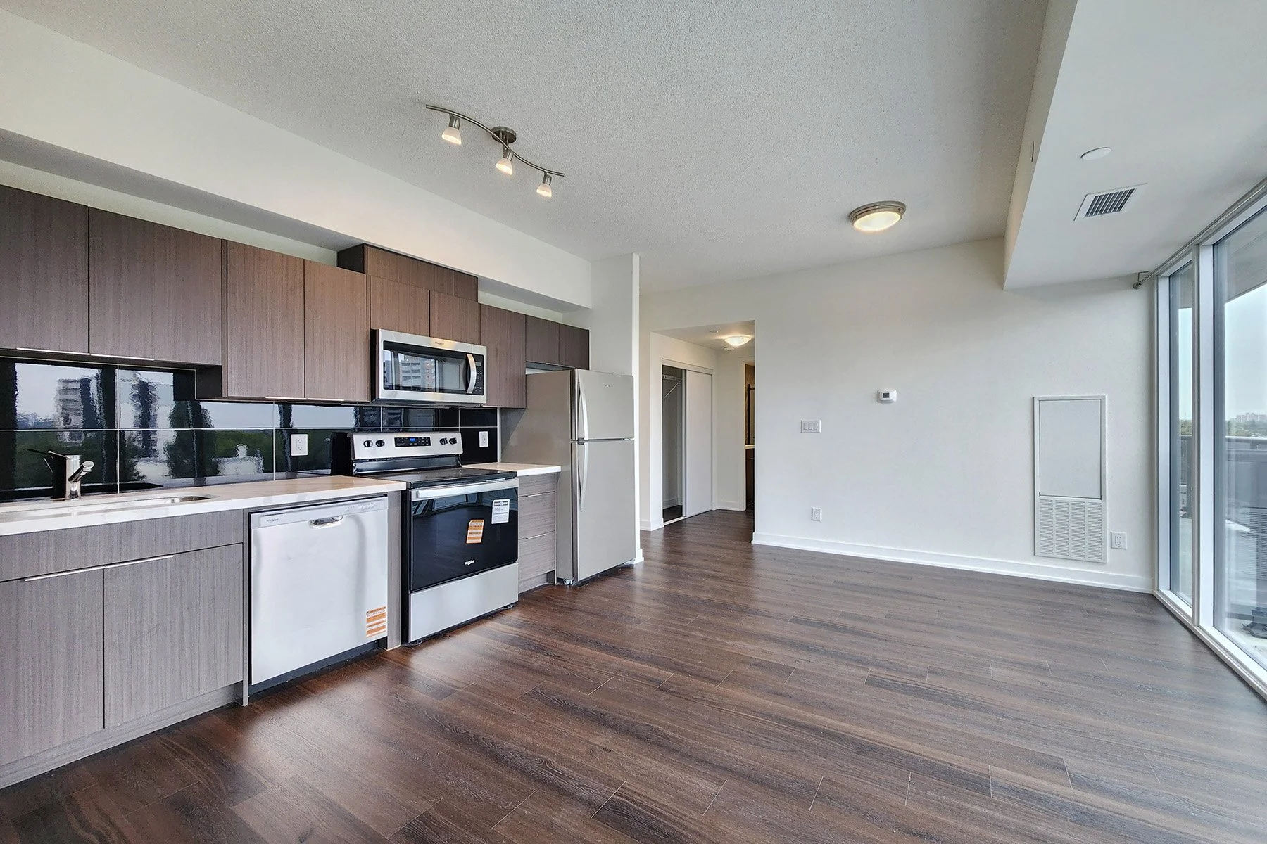 MLS08-2825Jane604-LivingDiningKitchen.jpg
