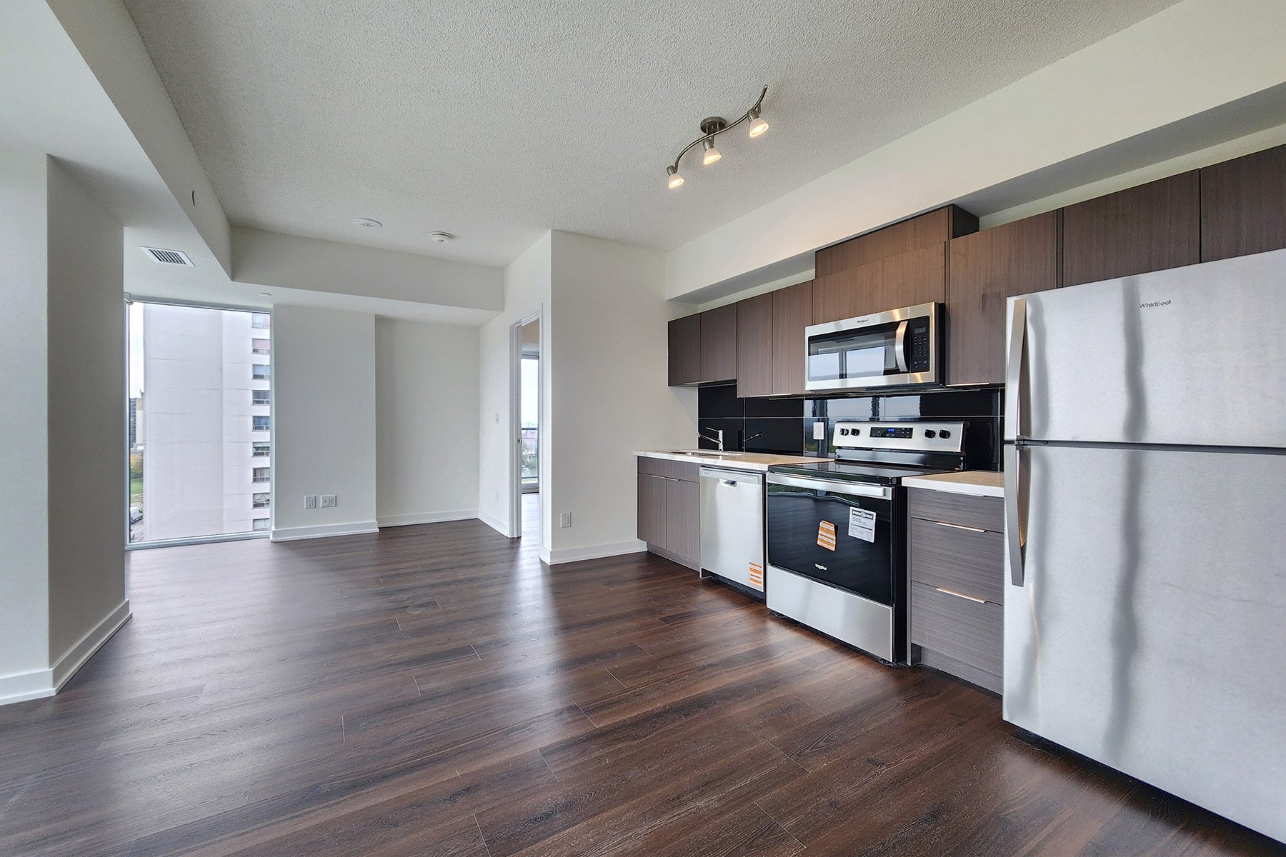 MLS06-2825Jane604-LivingDiningKitchen.jpg