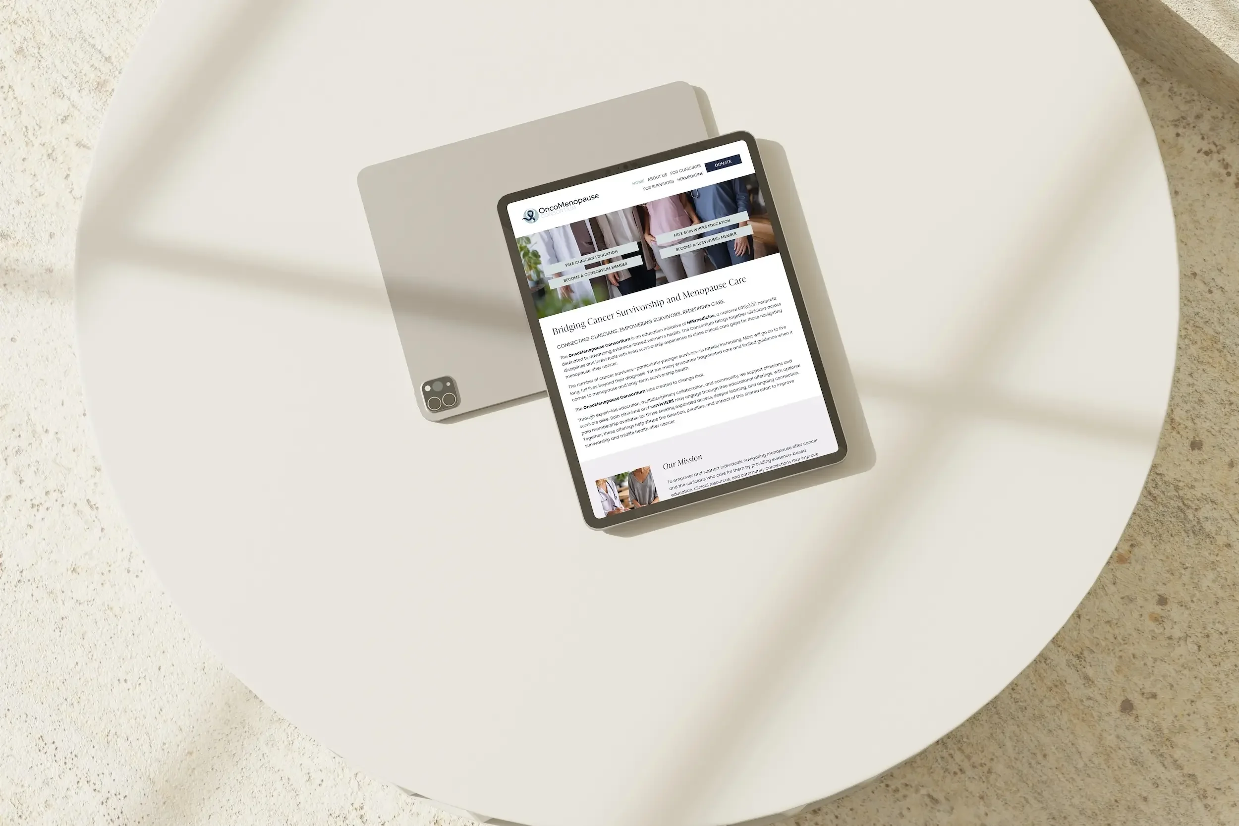 OncoMenopause Consortium homepage on iPad — Squarespace nonprofit website design by Jennifer Mager Creative
