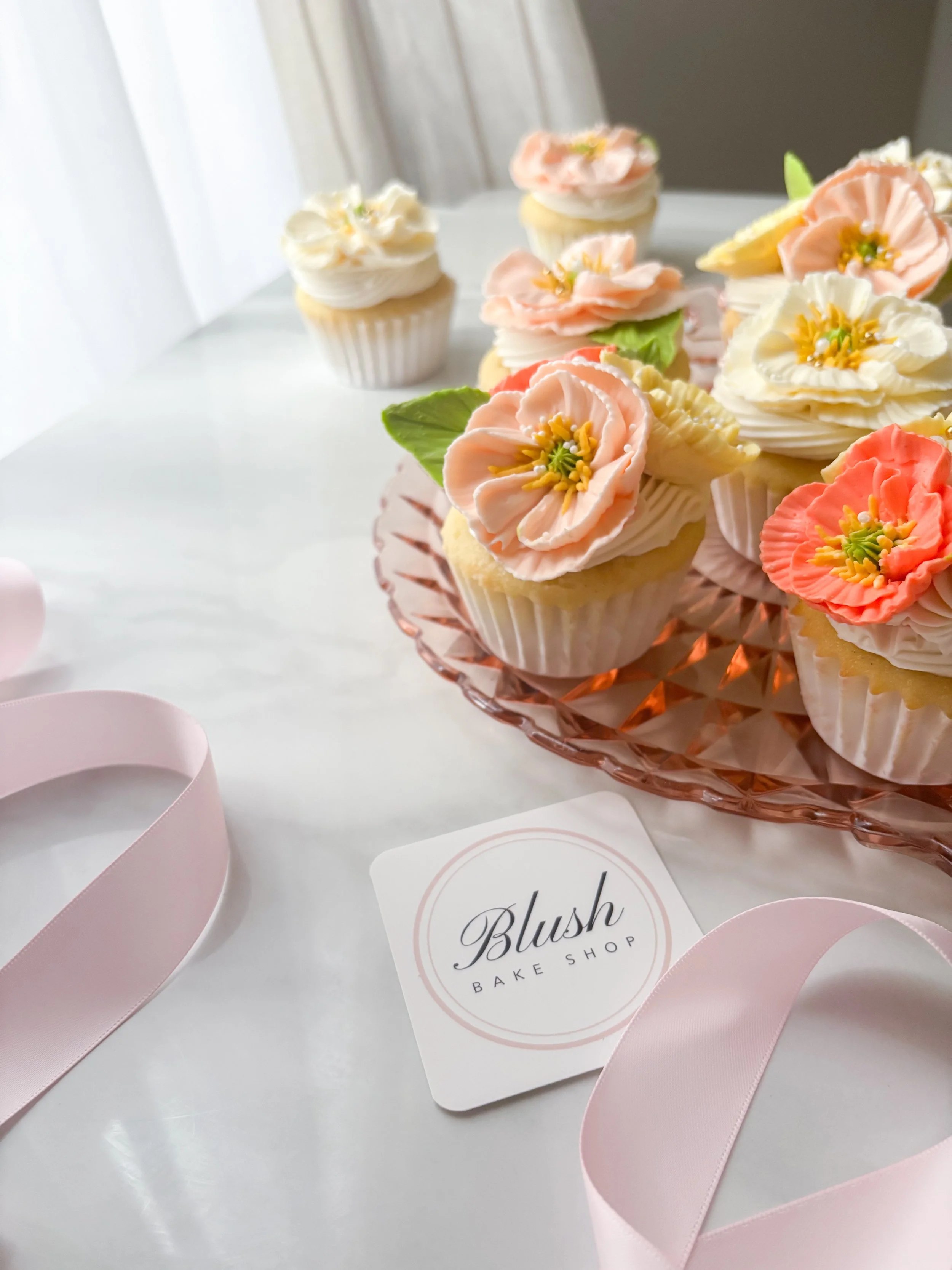 poppy buttercream flower cupcakes in blush shades