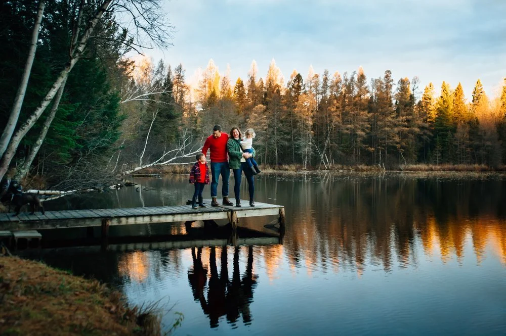 family on lake in fall in Minocqua wisconsin