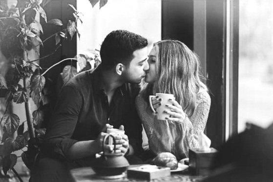 couple in love for unique coffee shop Engagement photos