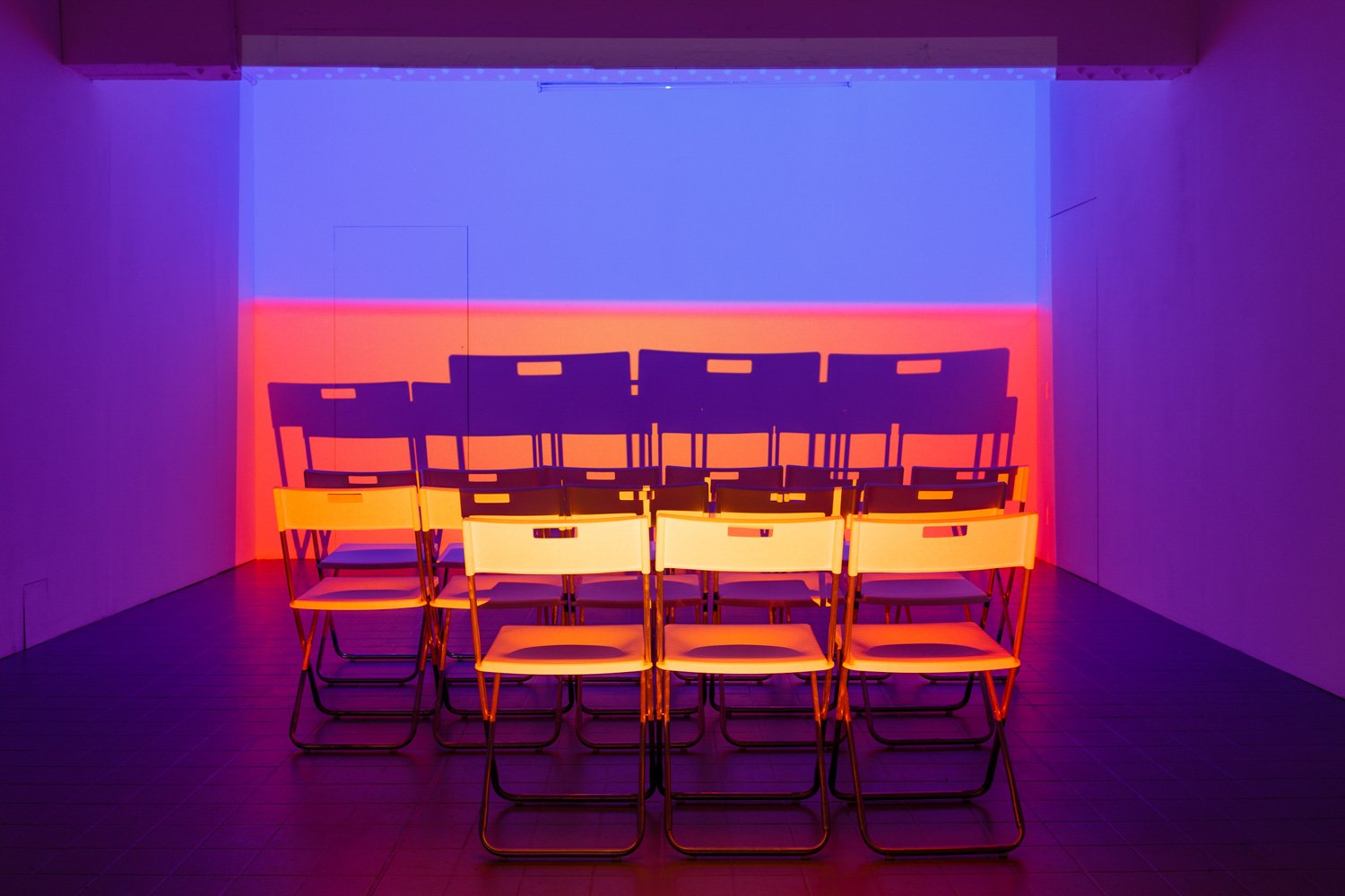 Assembly, 2016, projection (looped series of 147 stills for each of three projectors), chairs, dimensions variable
