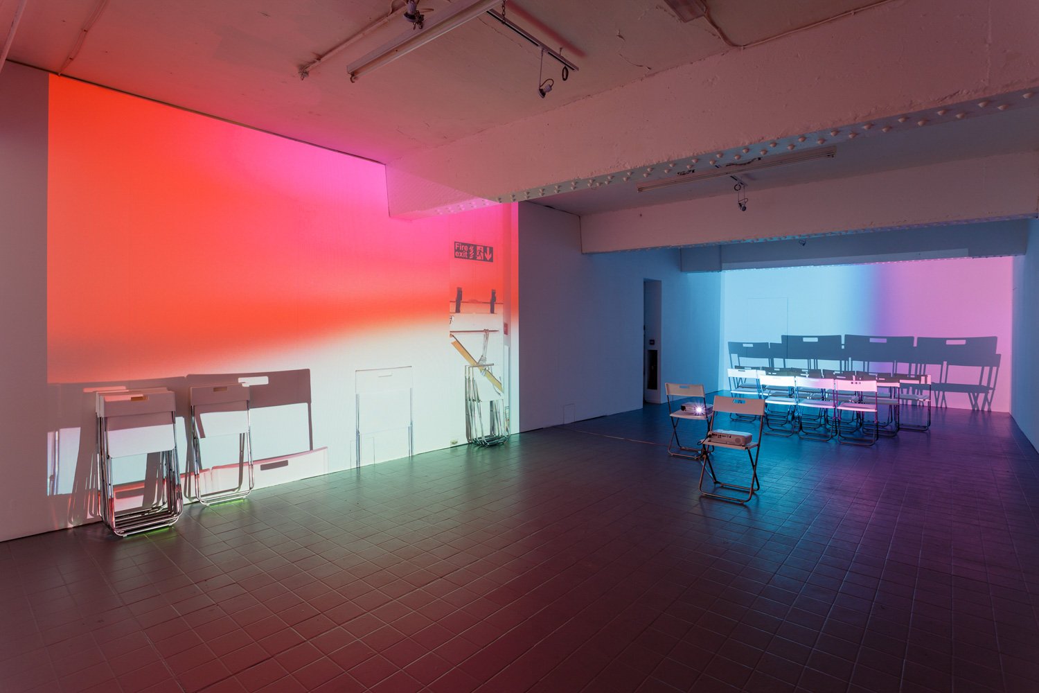 Assembly, 2016, projection (looped series of 147 stills for each of three projectors), chairs, dimensions variable