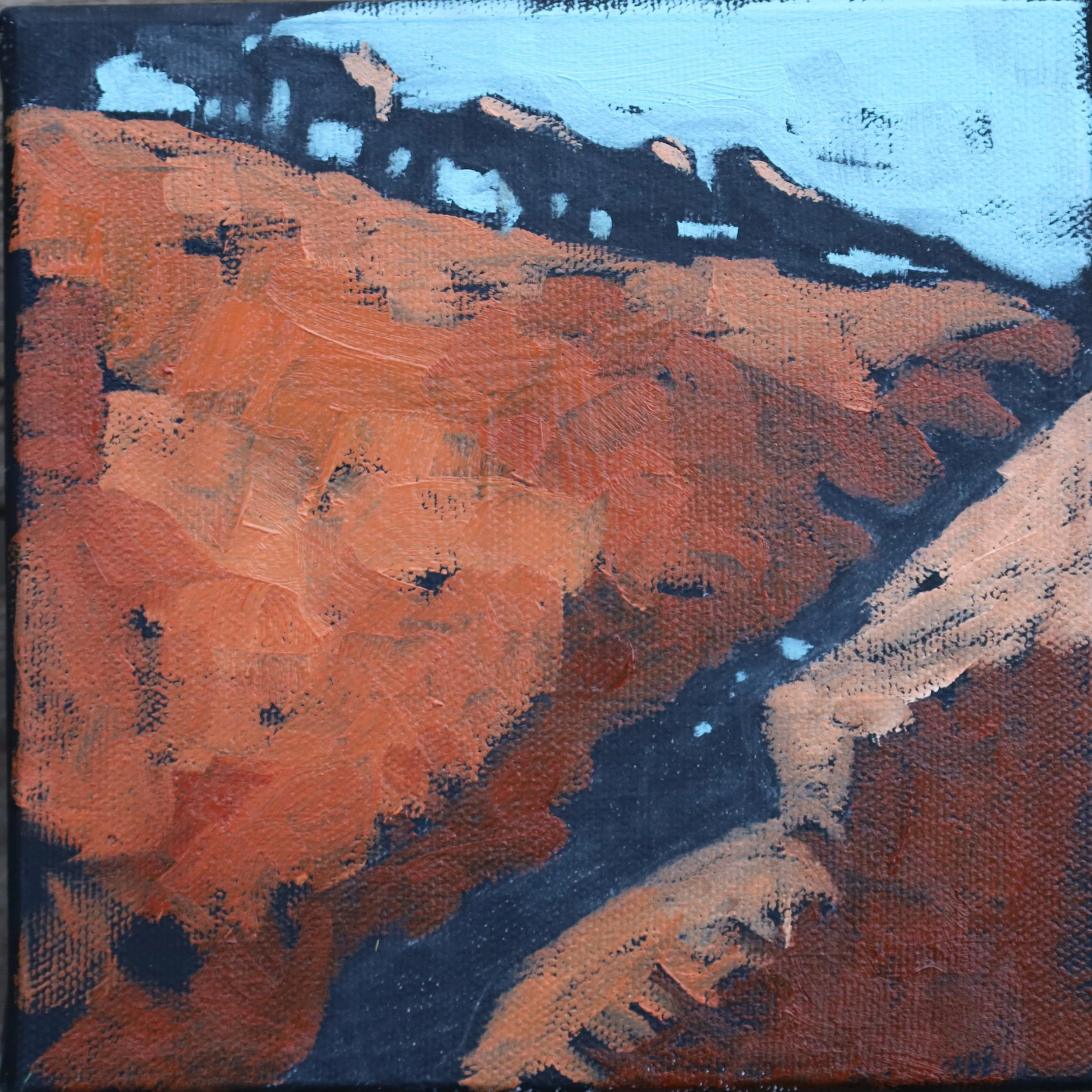 Abstract painting with orange, black, and light blue colors with textured brushstrokes.