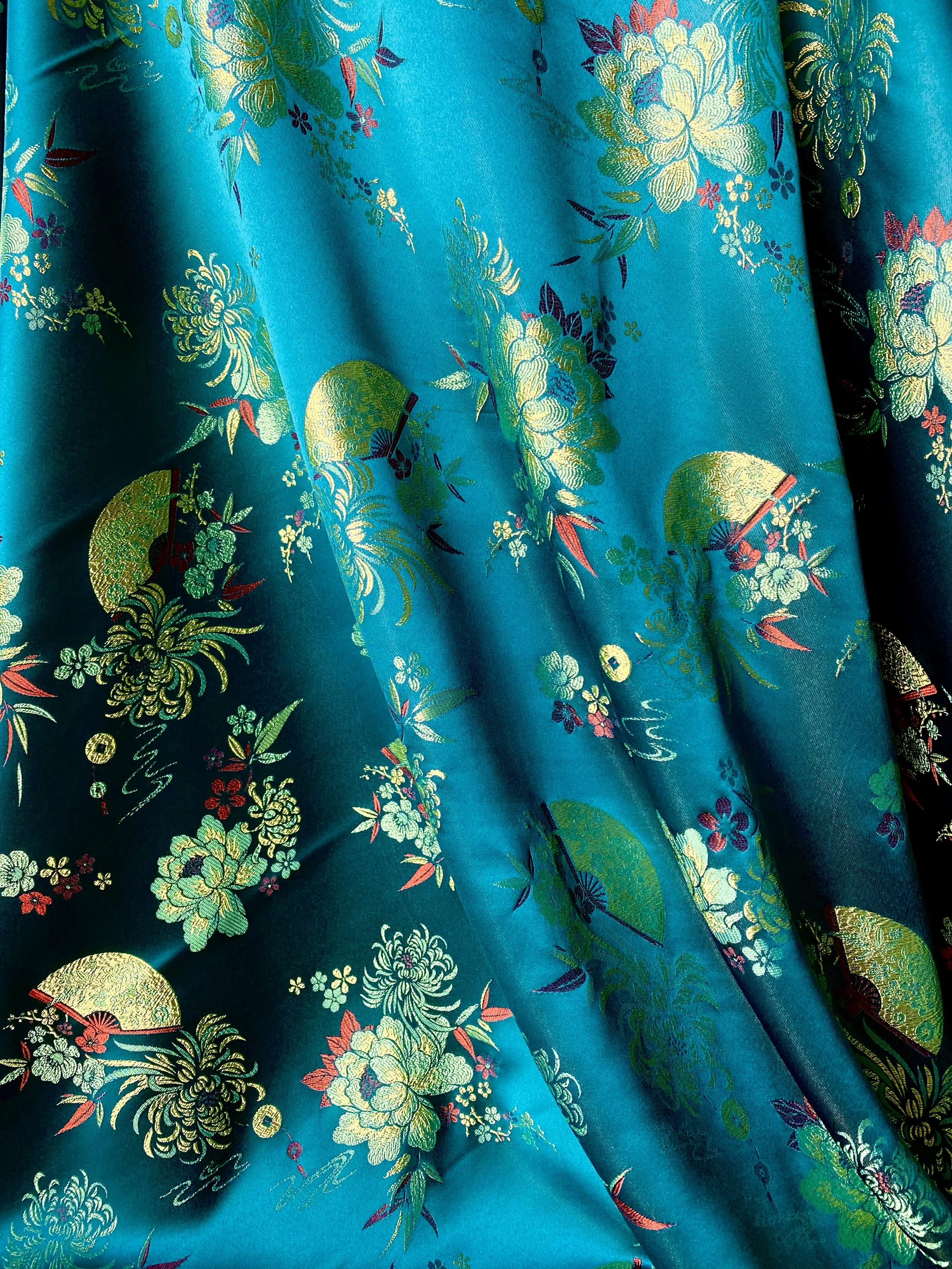 gấm xanh ngoc quạt.jpeg