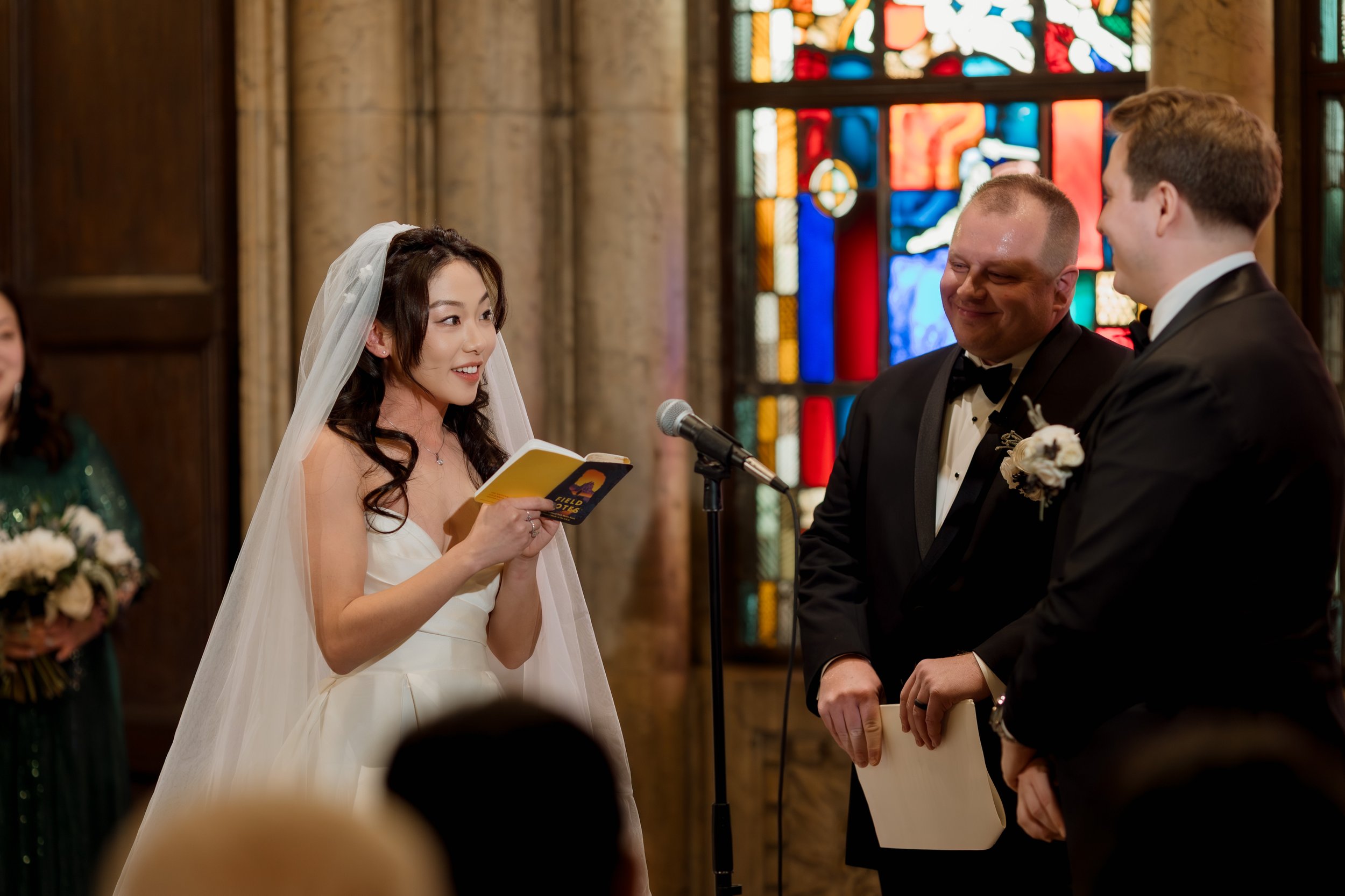 Bride reading vows at InterContinental Chicago wedding ceremony
