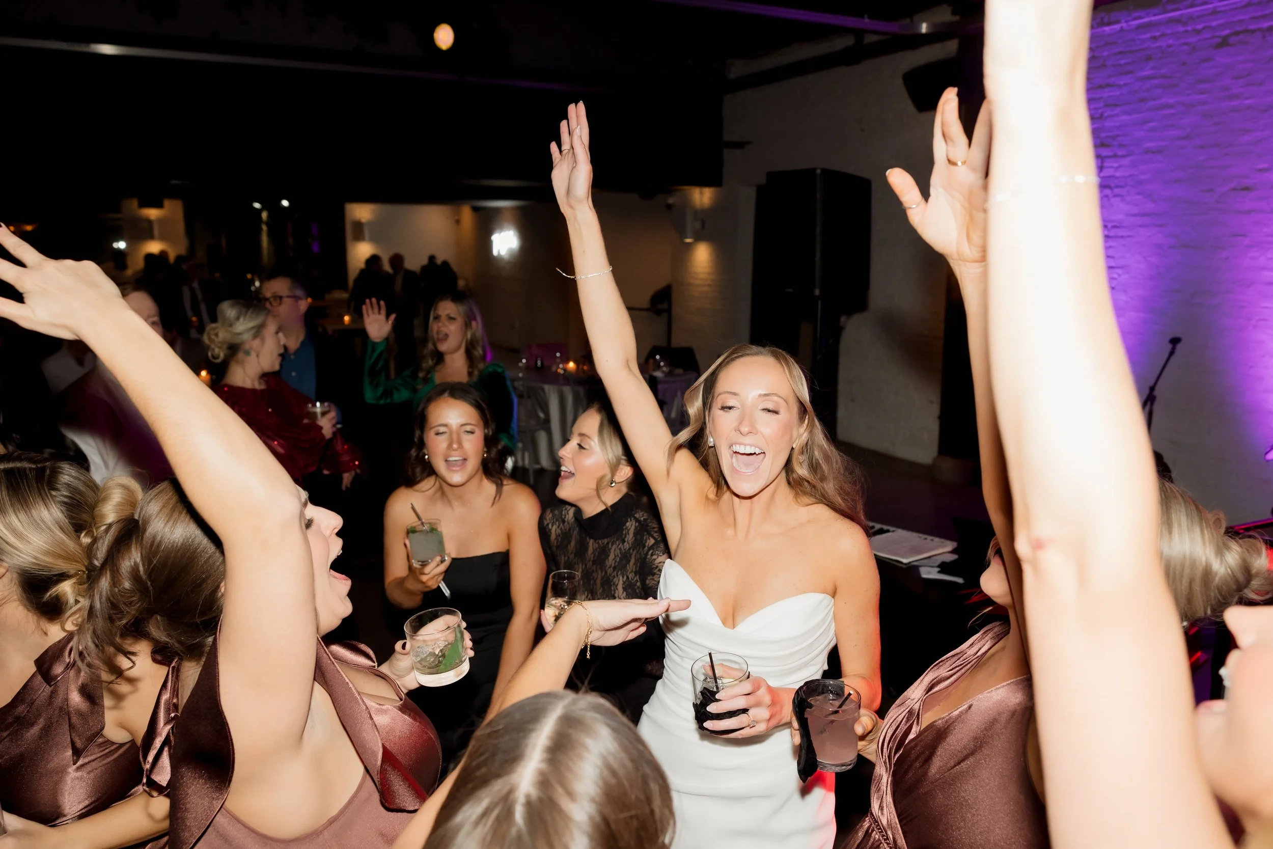 Bride dances with guests at Walden Chicago wedding reception