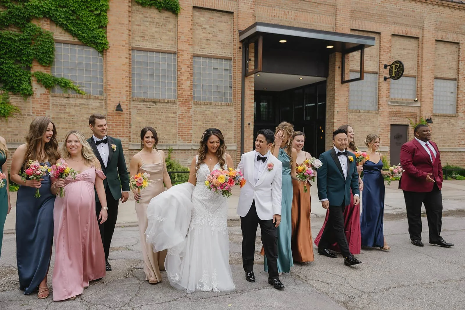 Bridal party walking together outside of Fairlie in Chicago