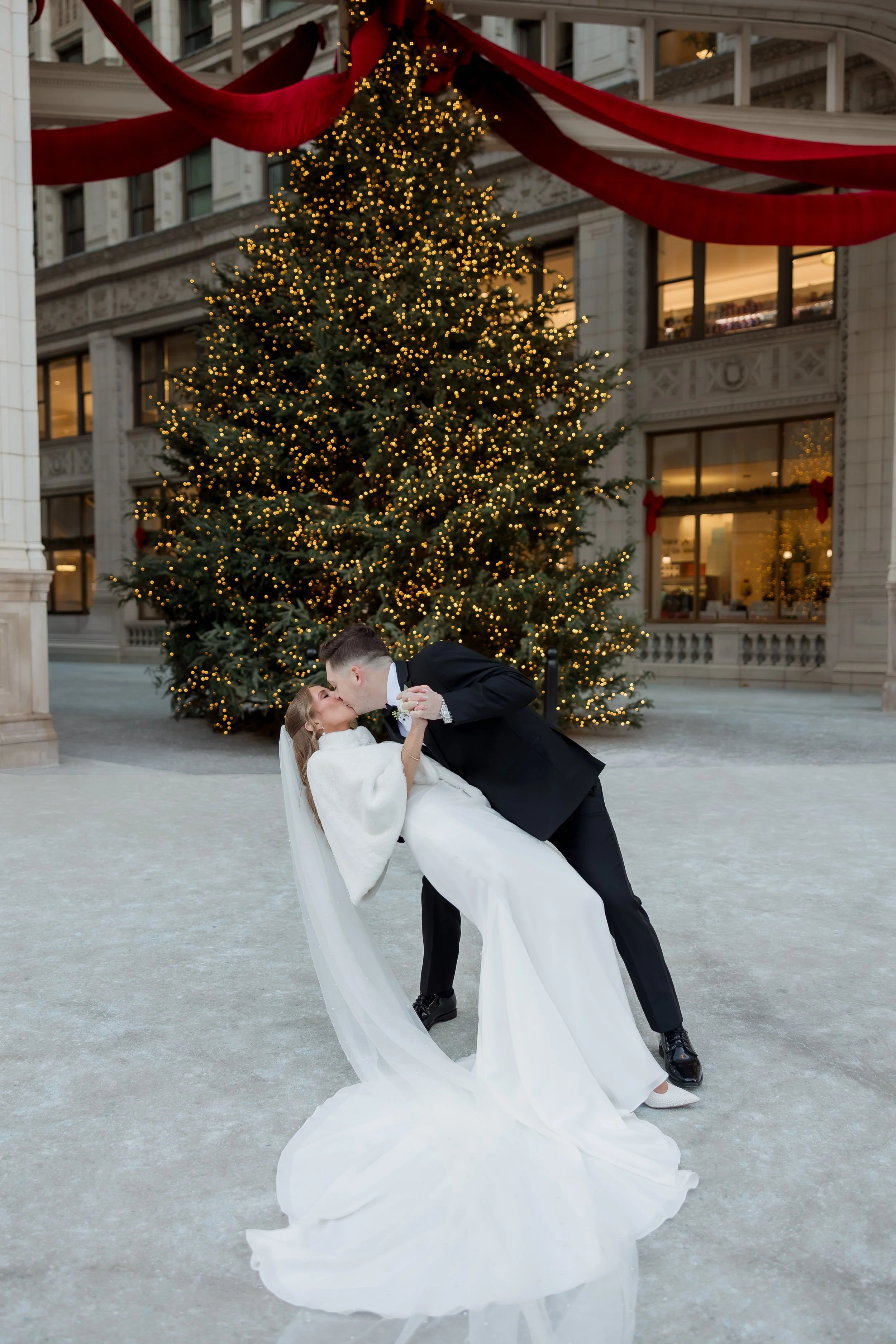 Christmas tree Wrigley Building bride and groom portrait