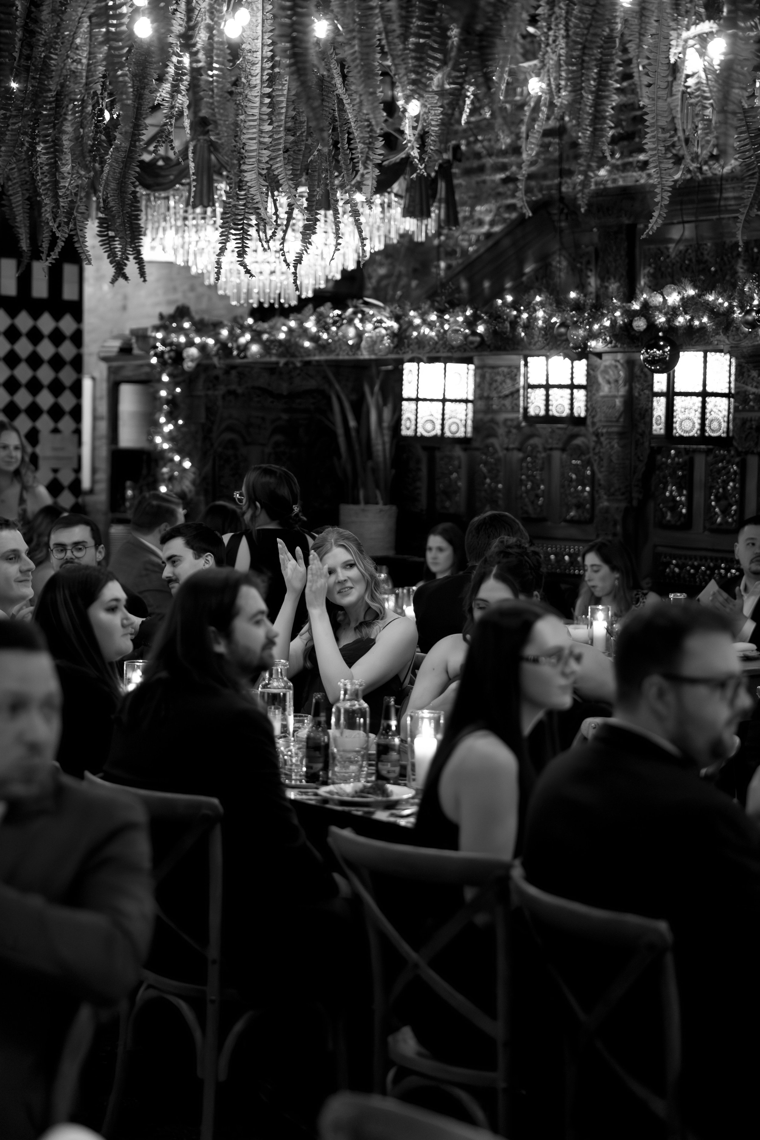 Guests clap at Beatnik West Town wedding reception