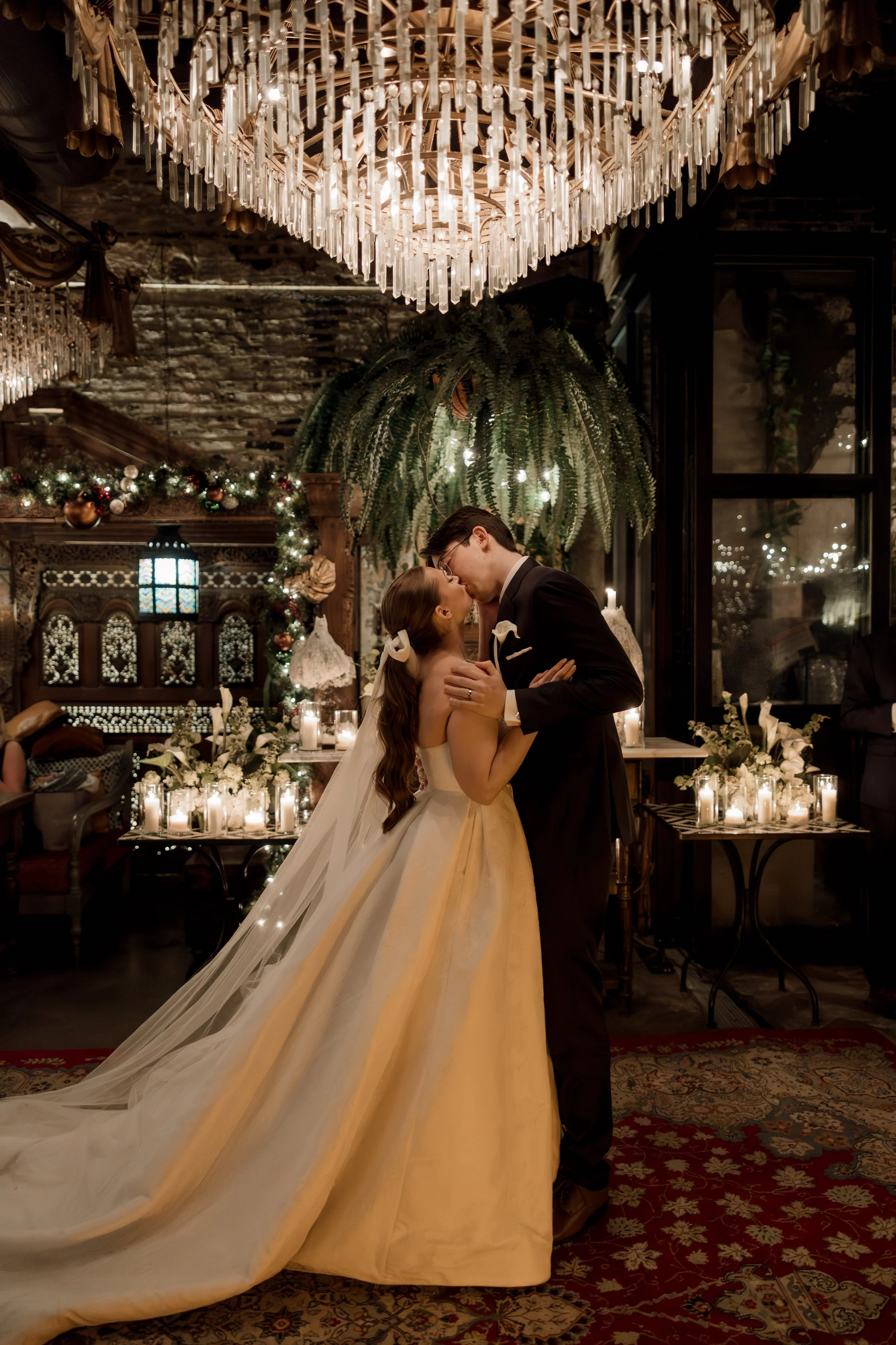 Bride and groom kiss at Beatnik West Town Chicago wedding venue