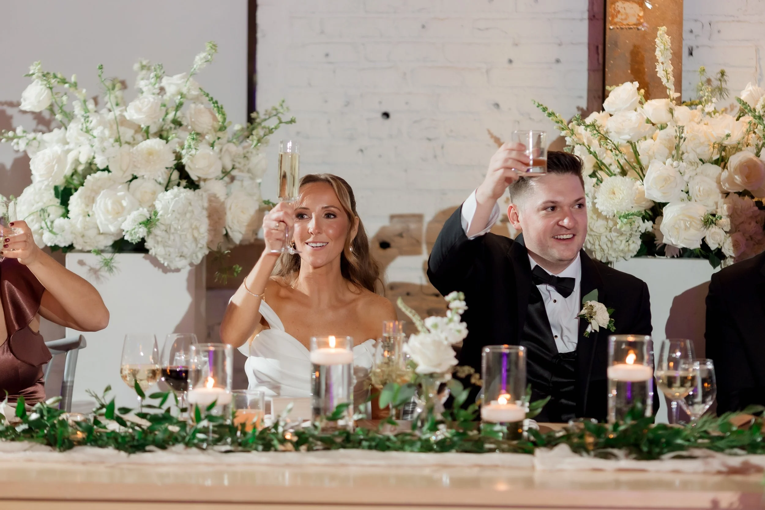 Couple toasts at their Walden Chicago wedding ceremony