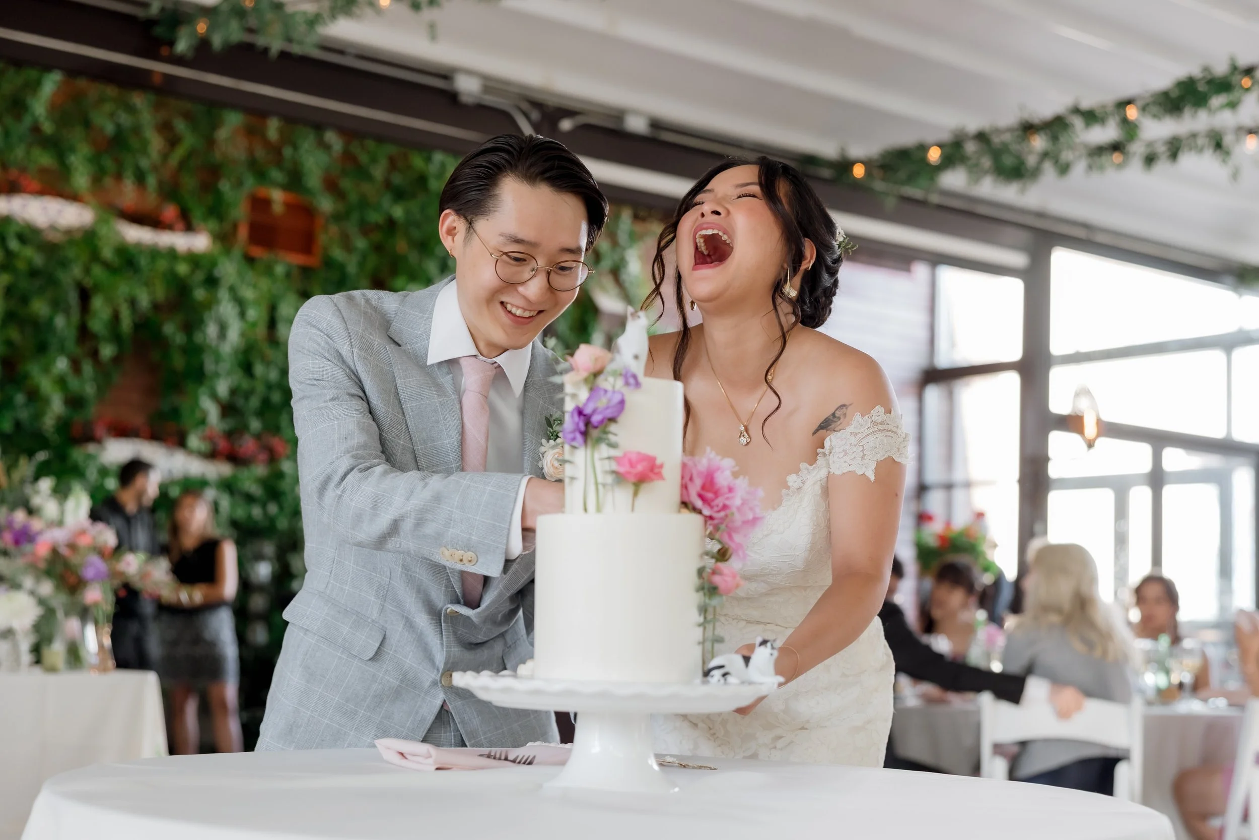 Bride and groom cake cutting at Galleria Marchetti La Pergola reception in Chicago