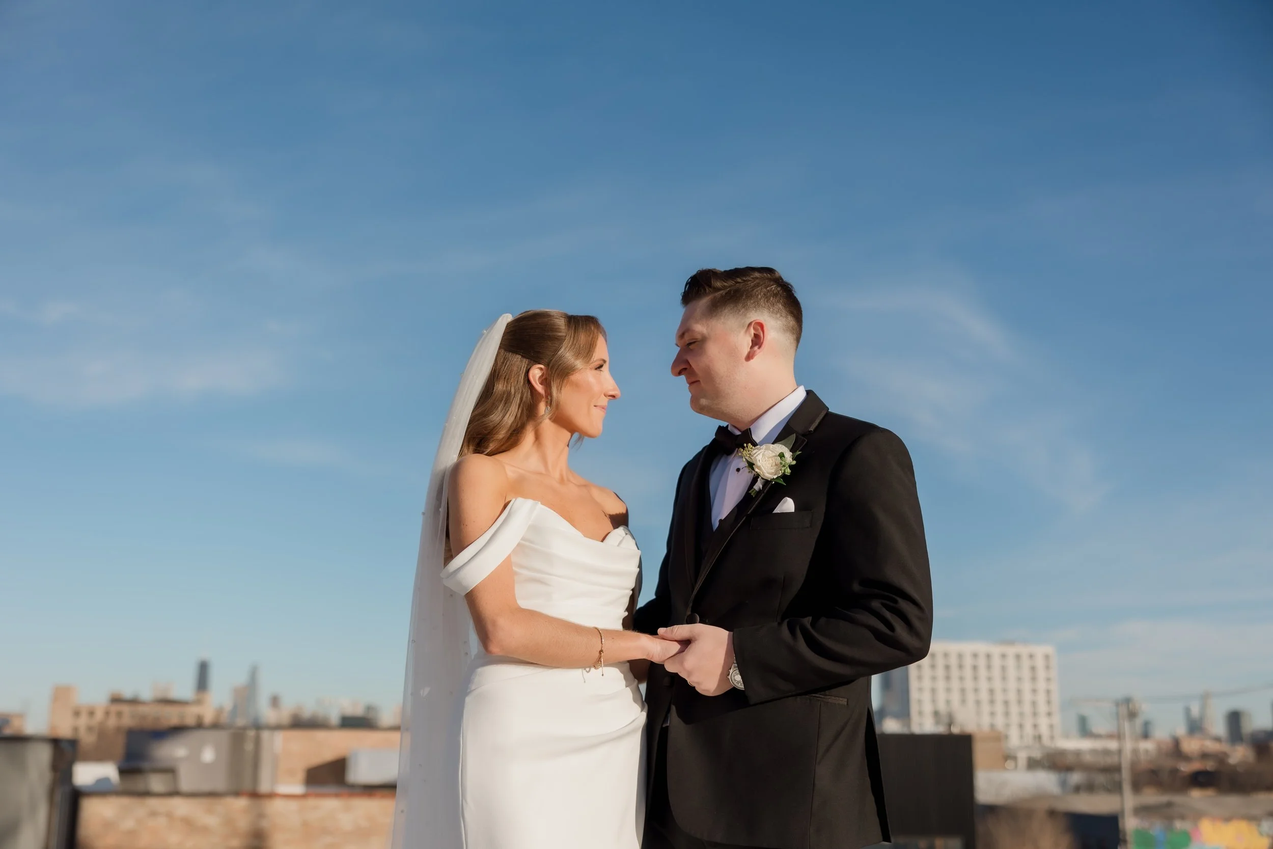 Rooftop portrait of a wedding couple at Walden Chicago