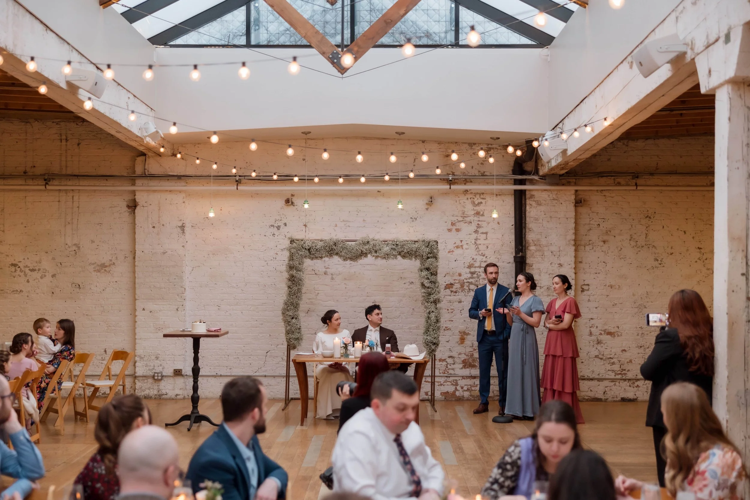 Wedding reception toasts at Chicago's The Joinery