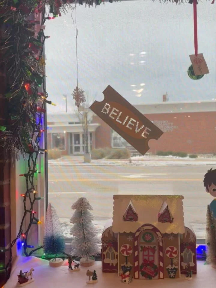 Thank you Deb And Lynn Borema for the fabulous Polar Express Christmas Window! Don&rsquo;t forget to click on the QR Code on our front door and vote! You could also win $100 in Downtown Dollars! 
.
#downtownludington #pureludington #sandcastleschildr