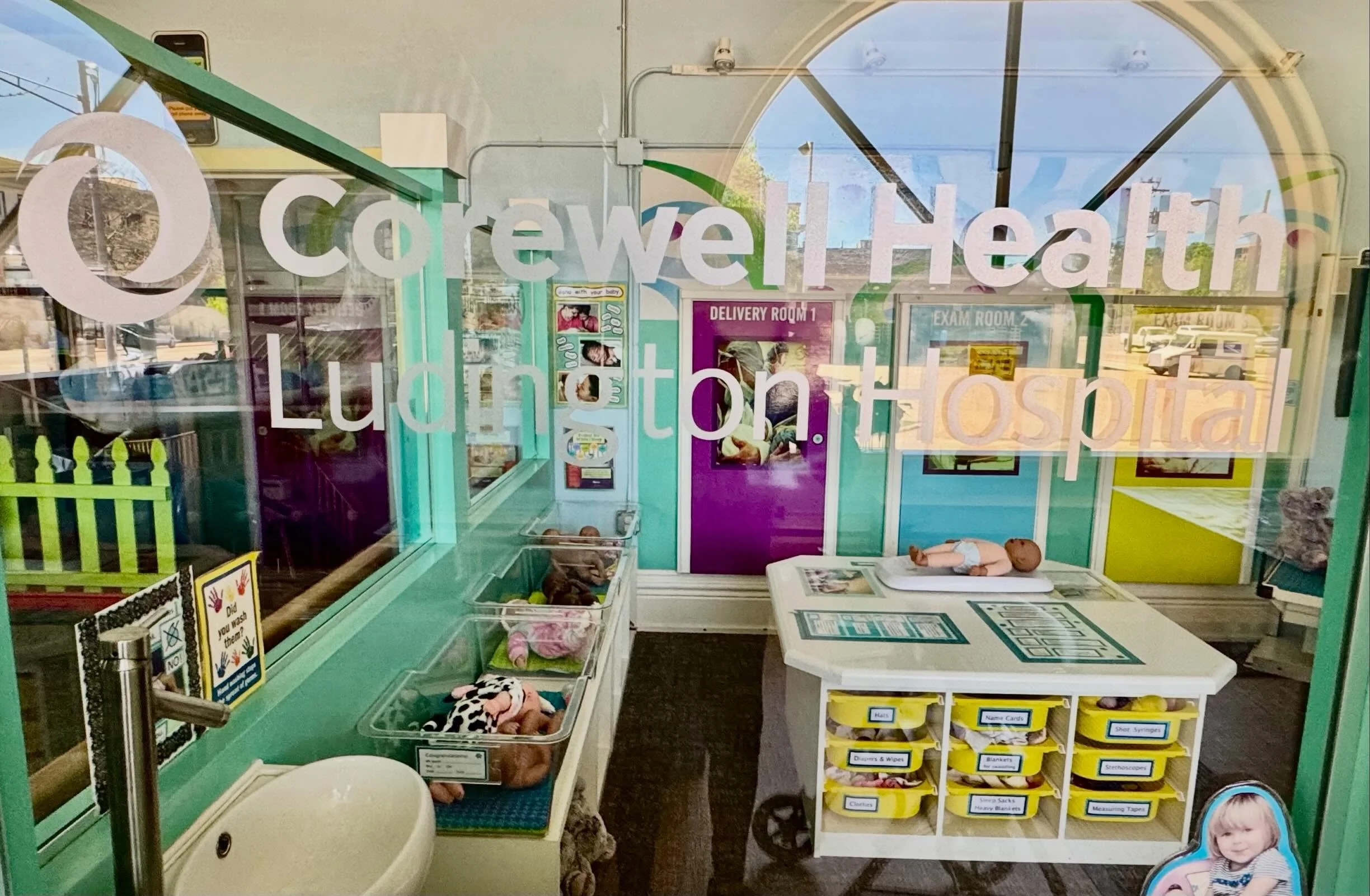 Have you visited our Corewell Health Ludington Hospital yet at Sandcastles? 

A pretend baby nursery is essential for children because it provides a safe space to practice empathy, develop emotional regulation, and process daily routines. Through rol