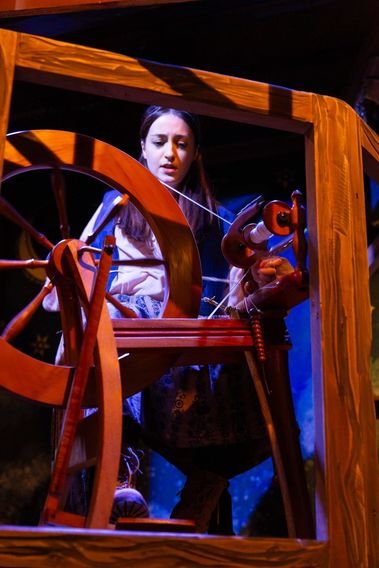 maia-at-spinning-wheel-portrait-min_47f2938421932695caeb613c45f537e8.jpeg